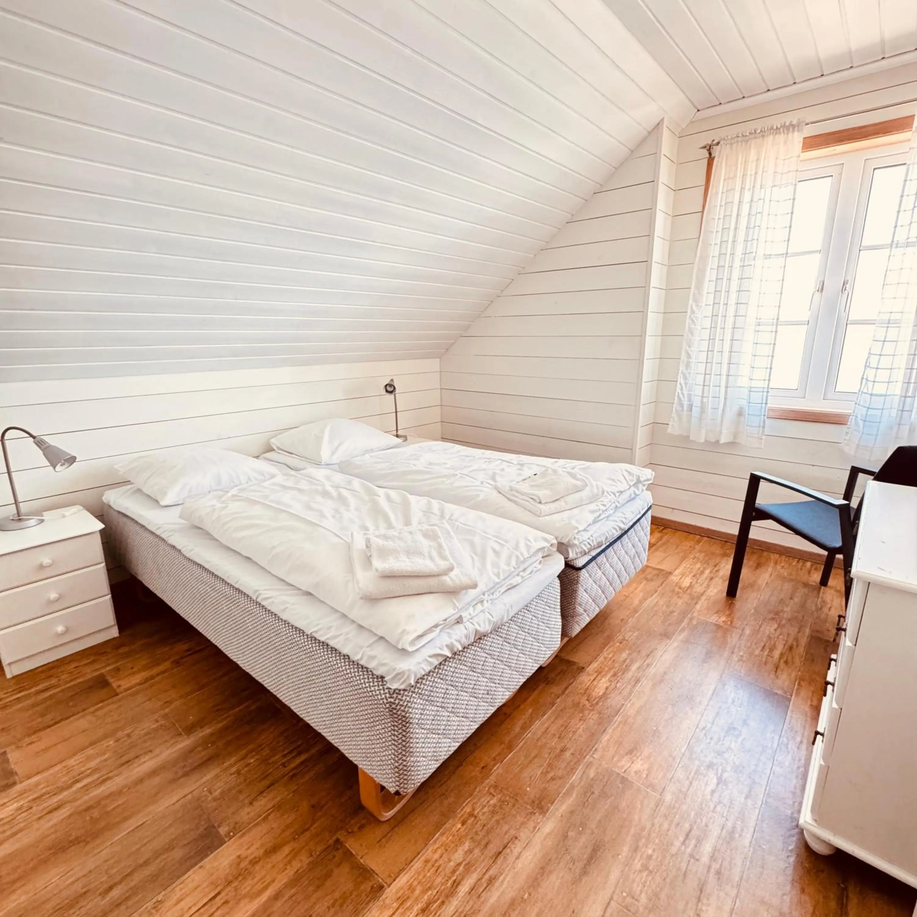 Bed in Sjøberg Hotell og Ferie Leiligheter