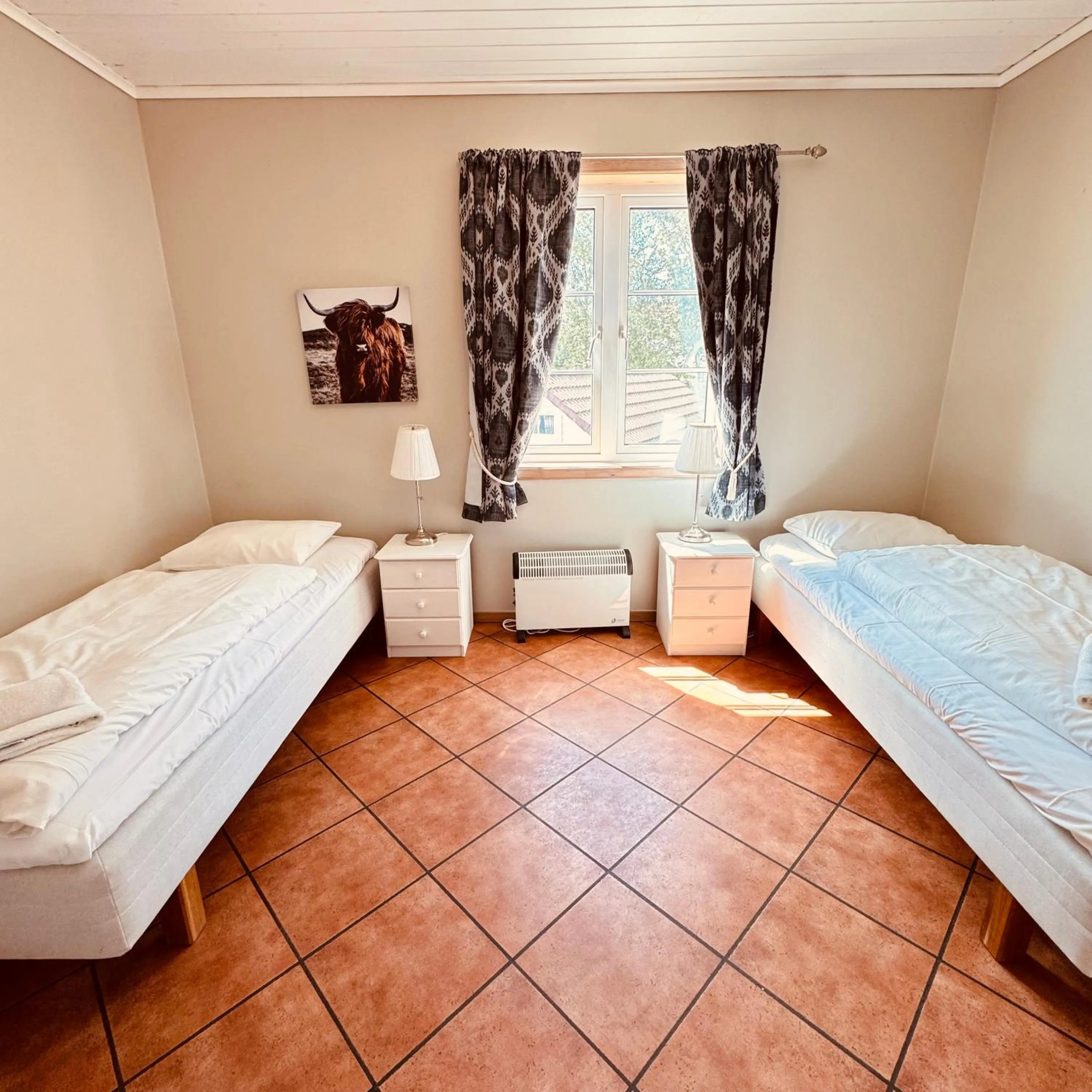 Bed in Sjøberg Hotell og Ferie Leiligheter