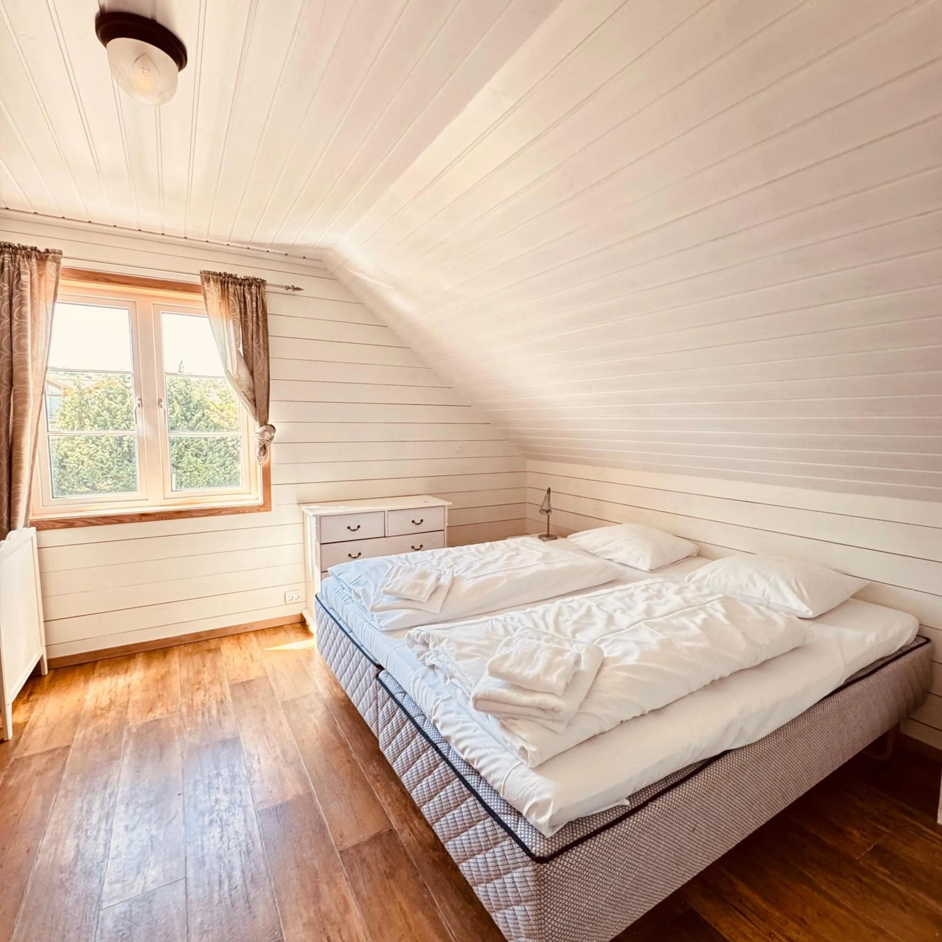 Bed in Sjøberg Hotell og Ferie Leiligheter