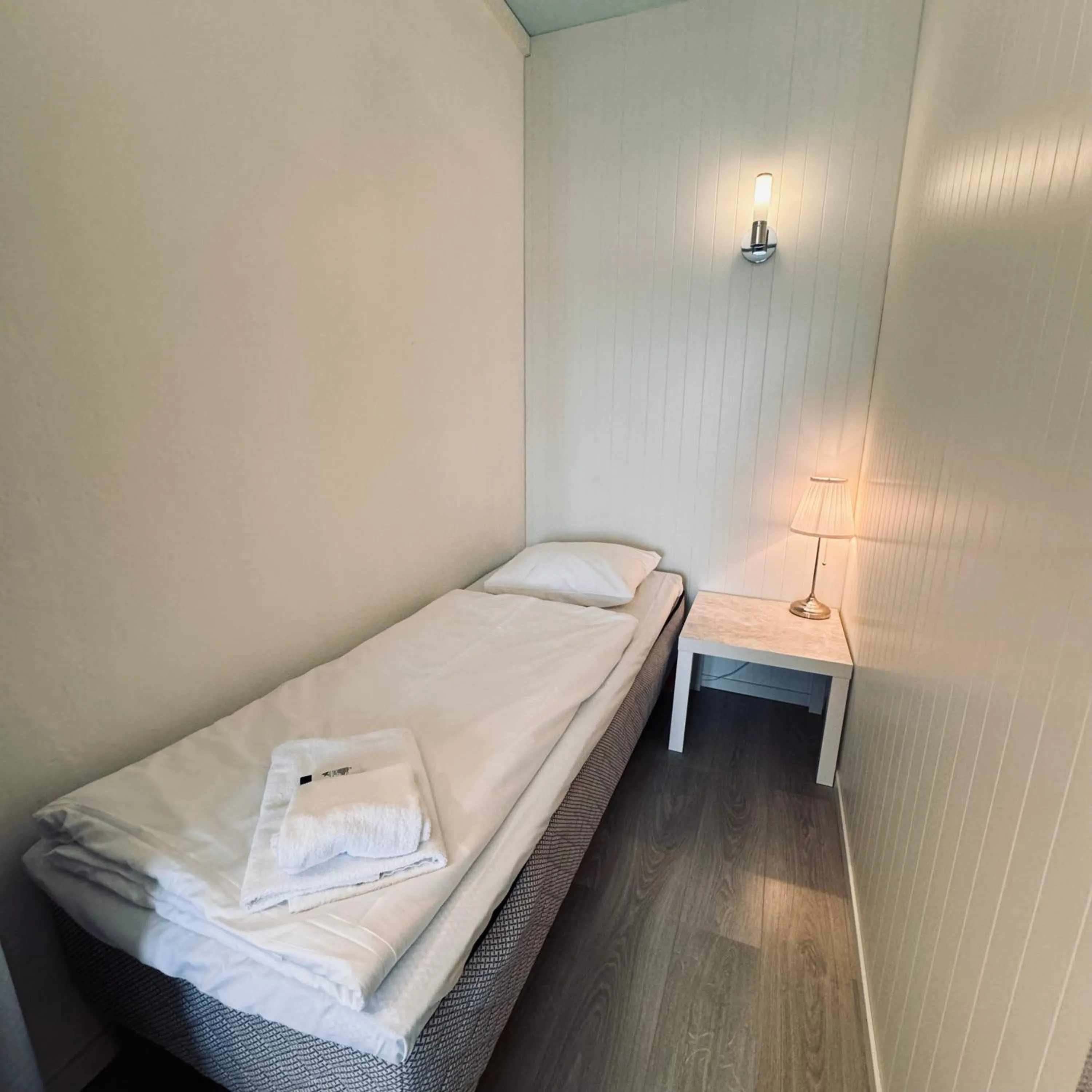 Bed in Sjøberg Hotell og Ferie Leiligheter