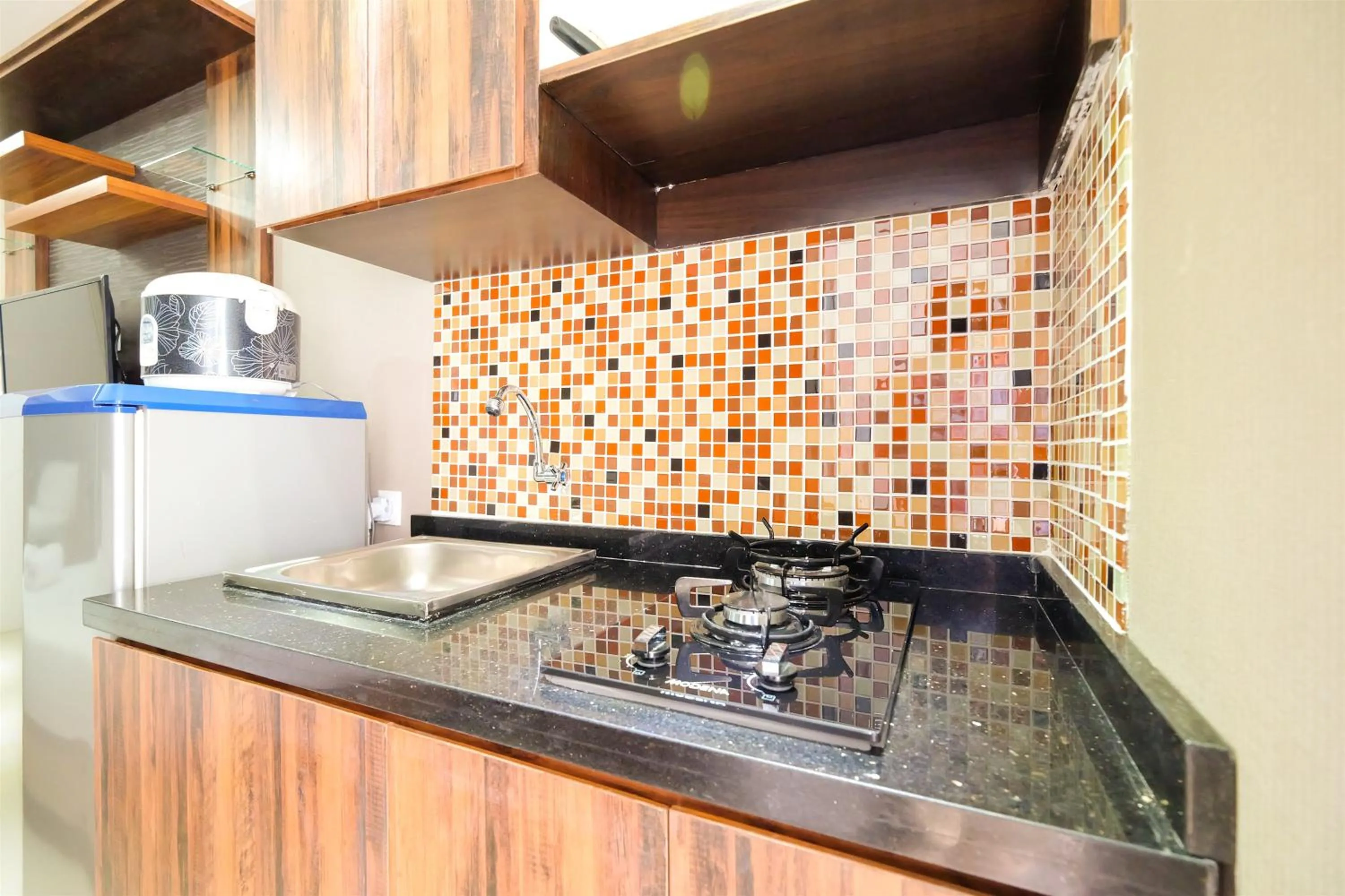 Kitchen or kitchenette in Simple Studio Bassura City Apartment By Travelio