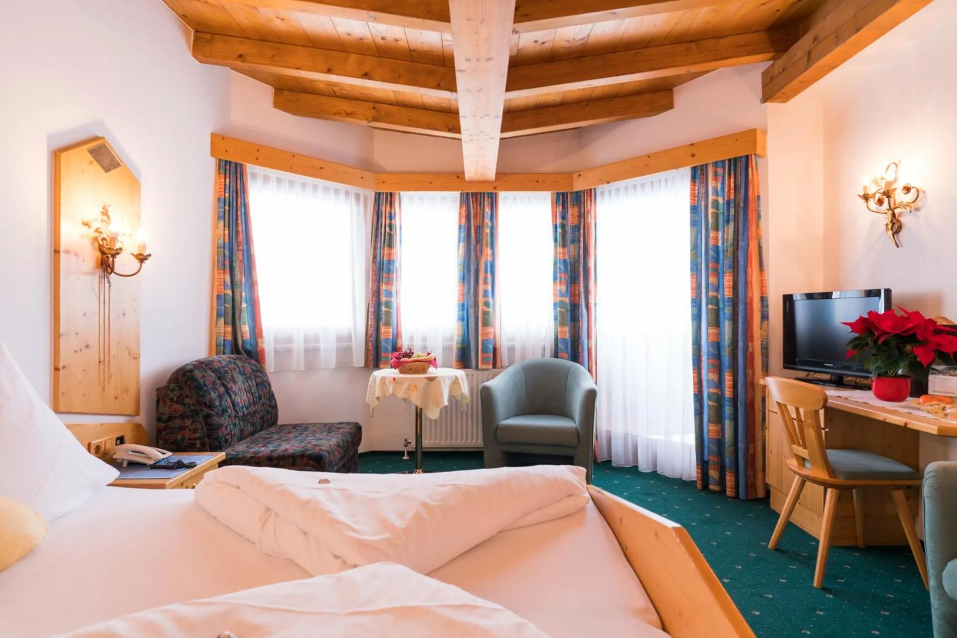 Photo of the whole room, Bed in Bergsporthotel Antonie