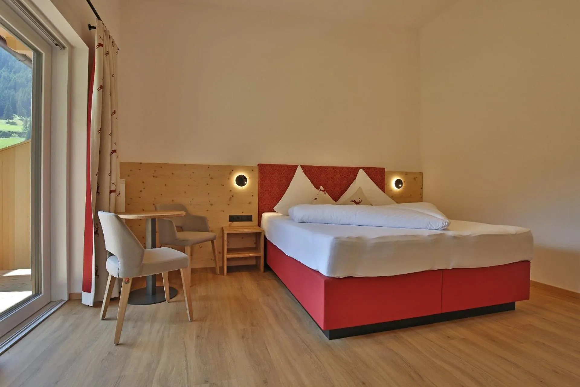 Photo of the whole room, Bed in Bergsporthotel Antonie