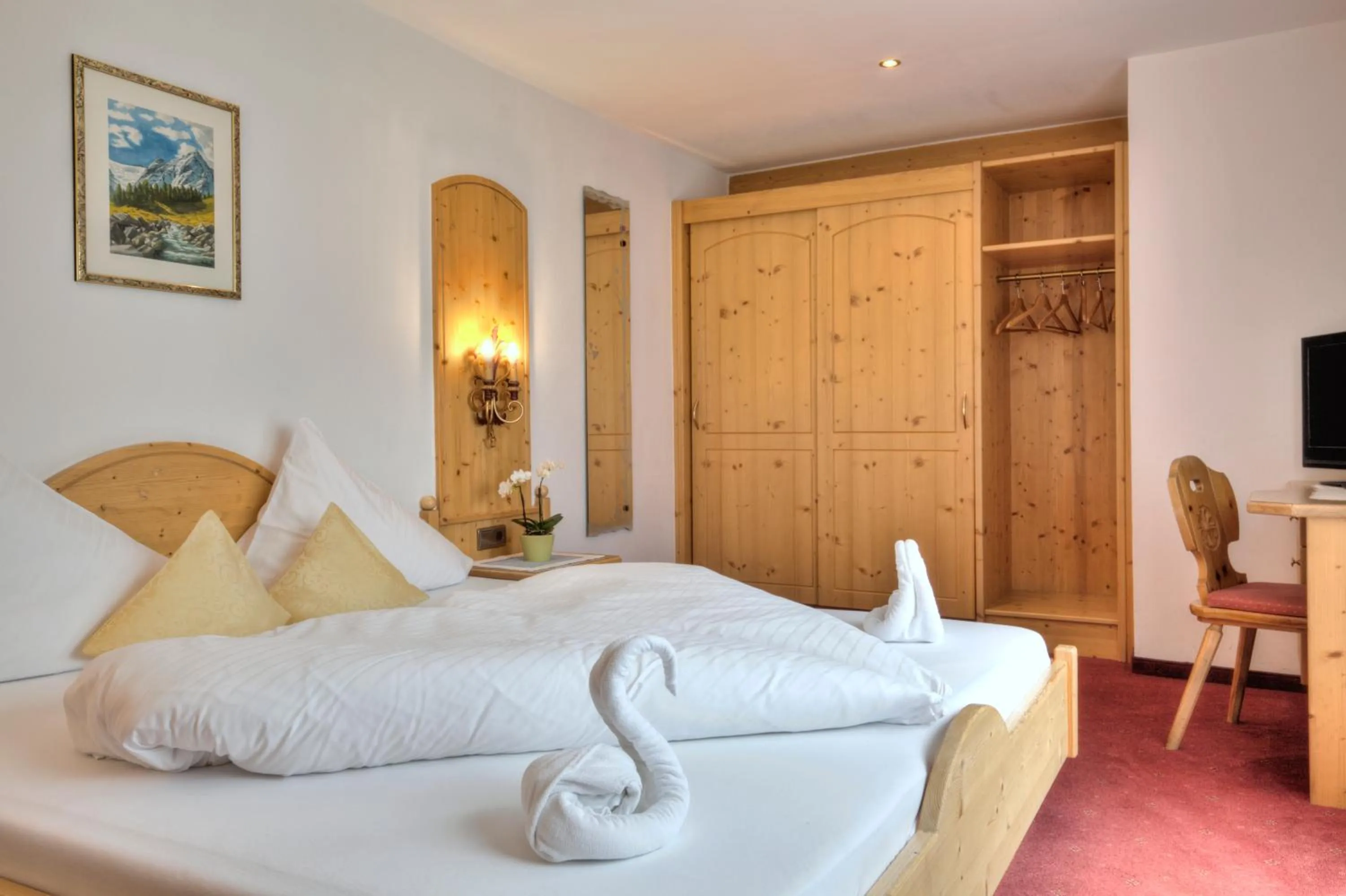 Photo of the whole room, Bed in Bergsporthotel Antonie