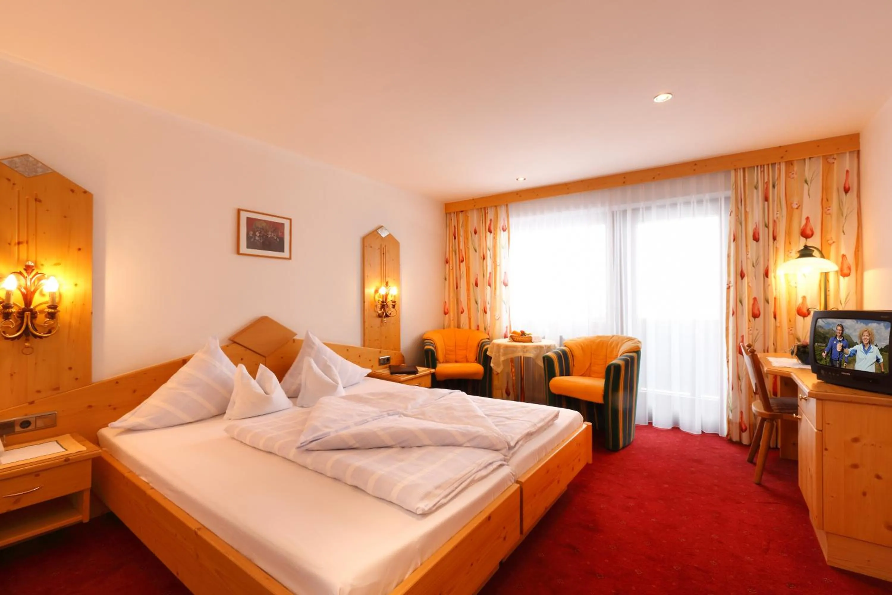 Photo of the whole room, Bed in Bergsporthotel Antonie