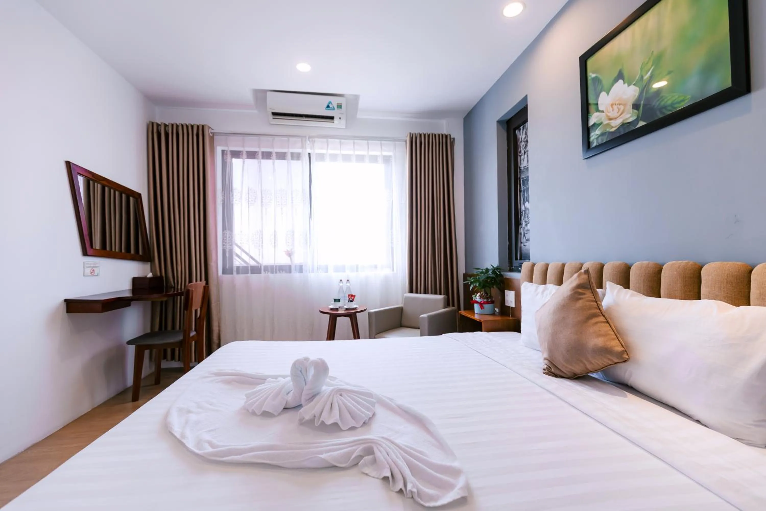 Bed in Gardenia Hue Hotel