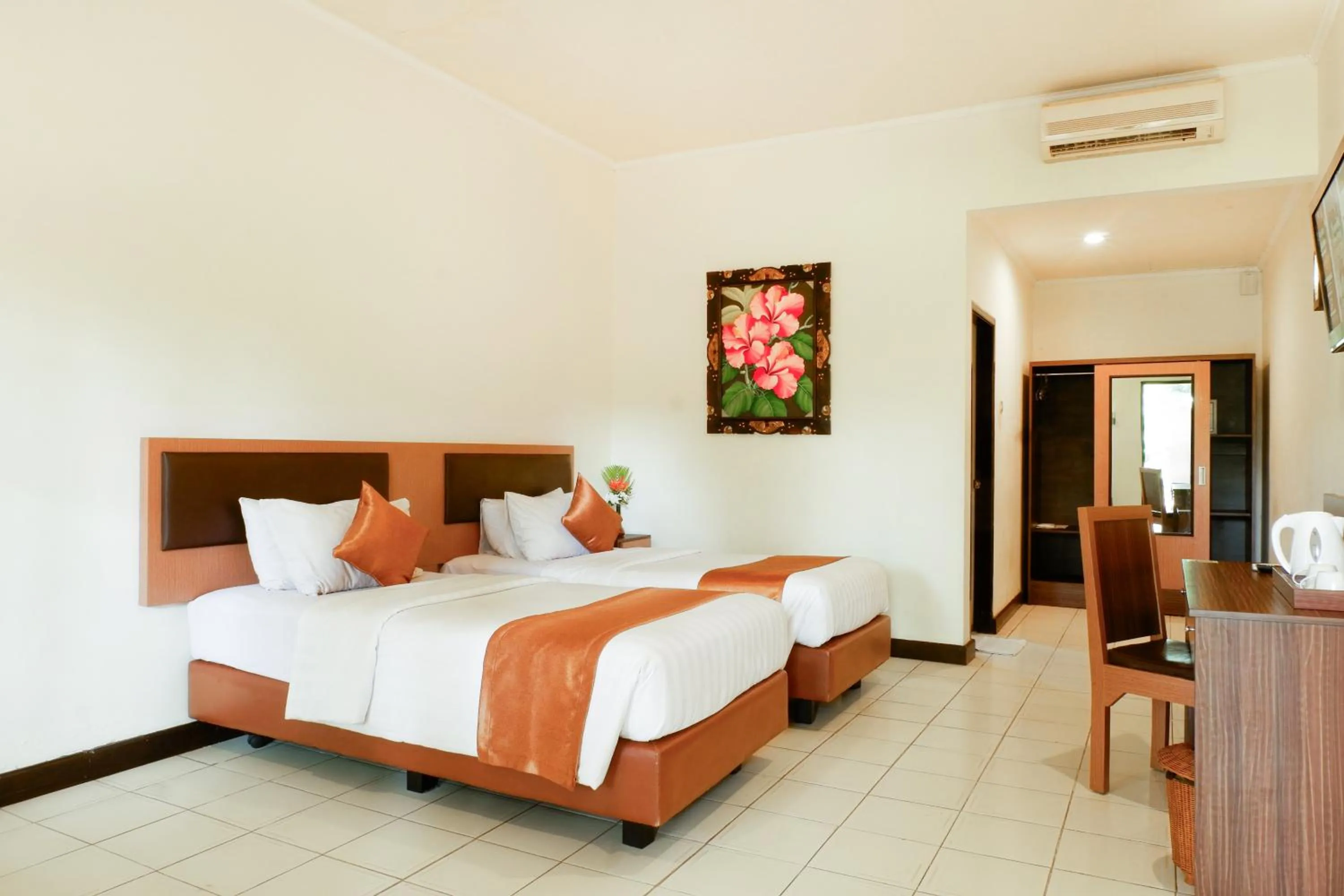 Bed in Lombok Garden Hotel