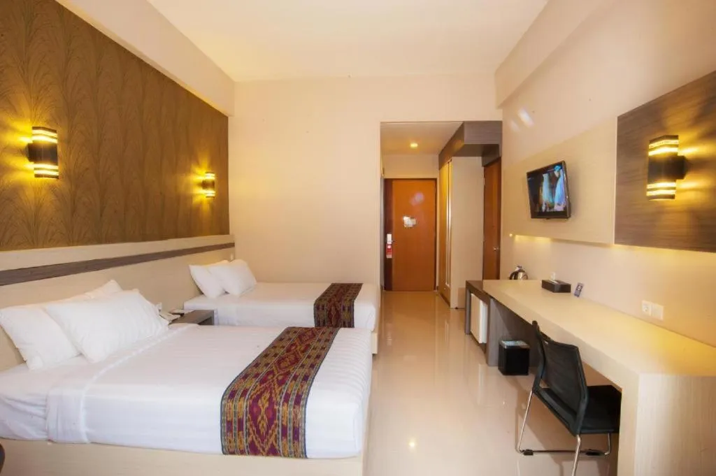 Bed in Lombok Raya Hotel