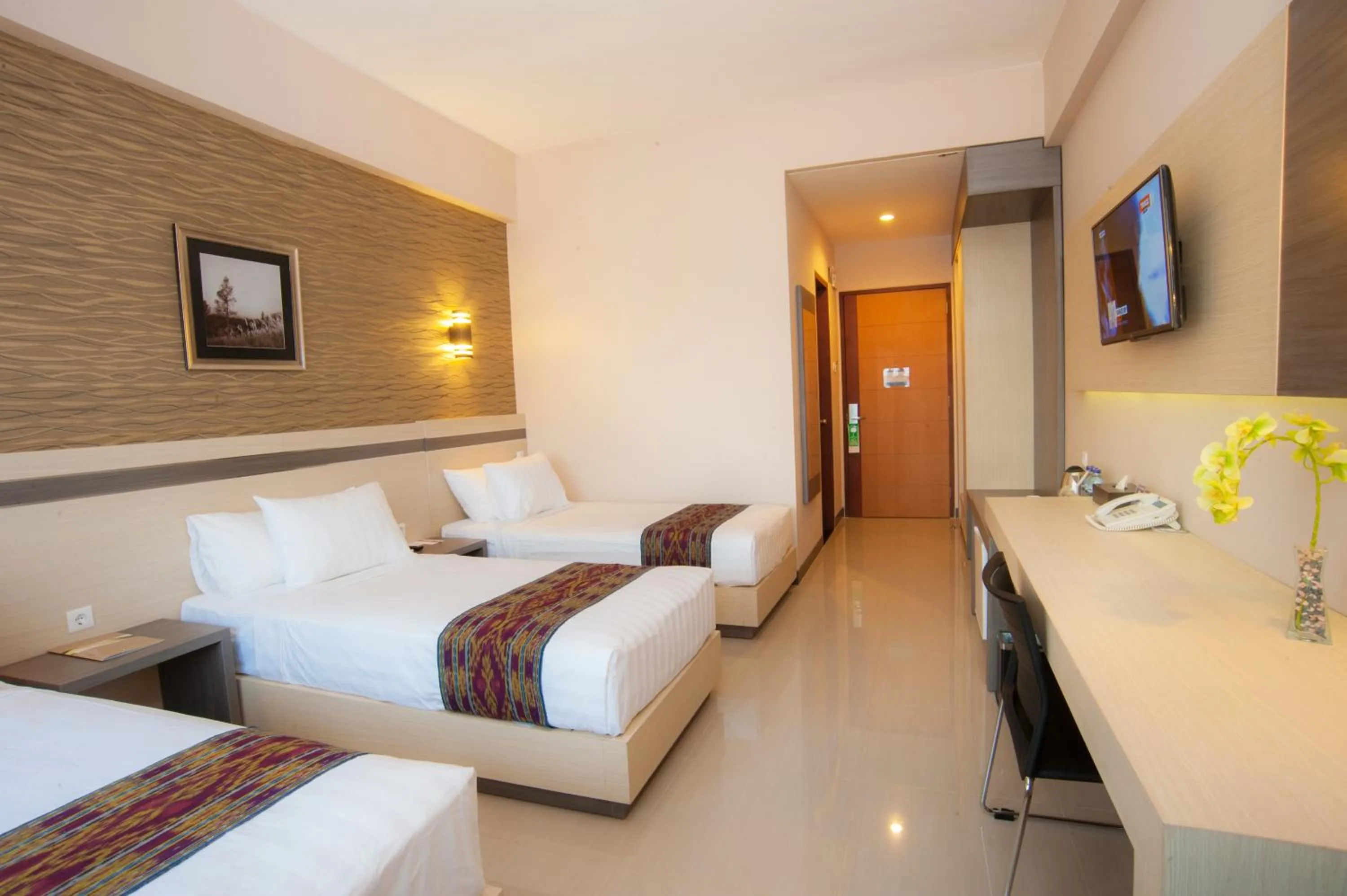 Bedroom, Bed in Lombok Raya Hotel