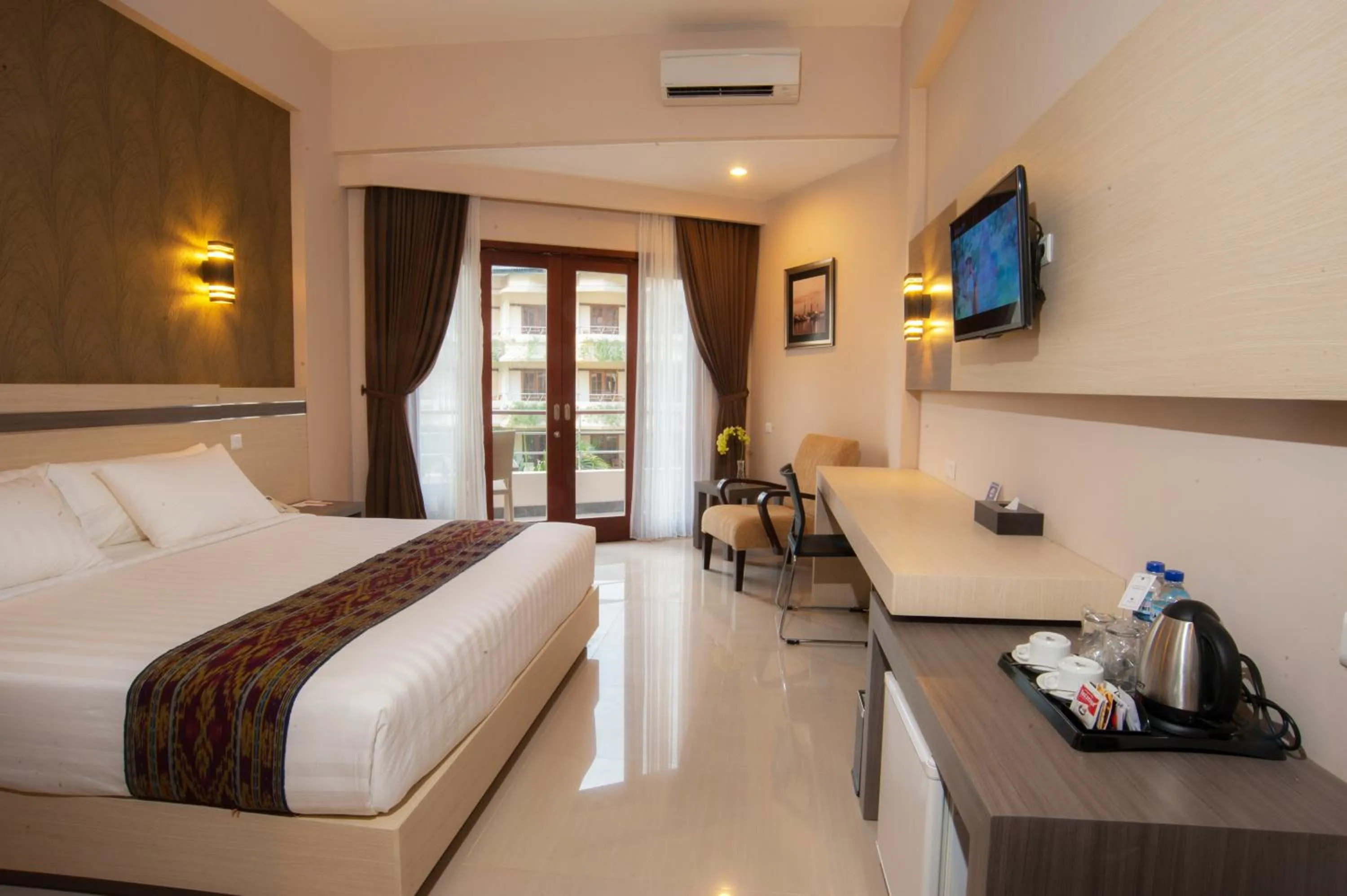 Bedroom, Bed in Lombok Raya Hotel