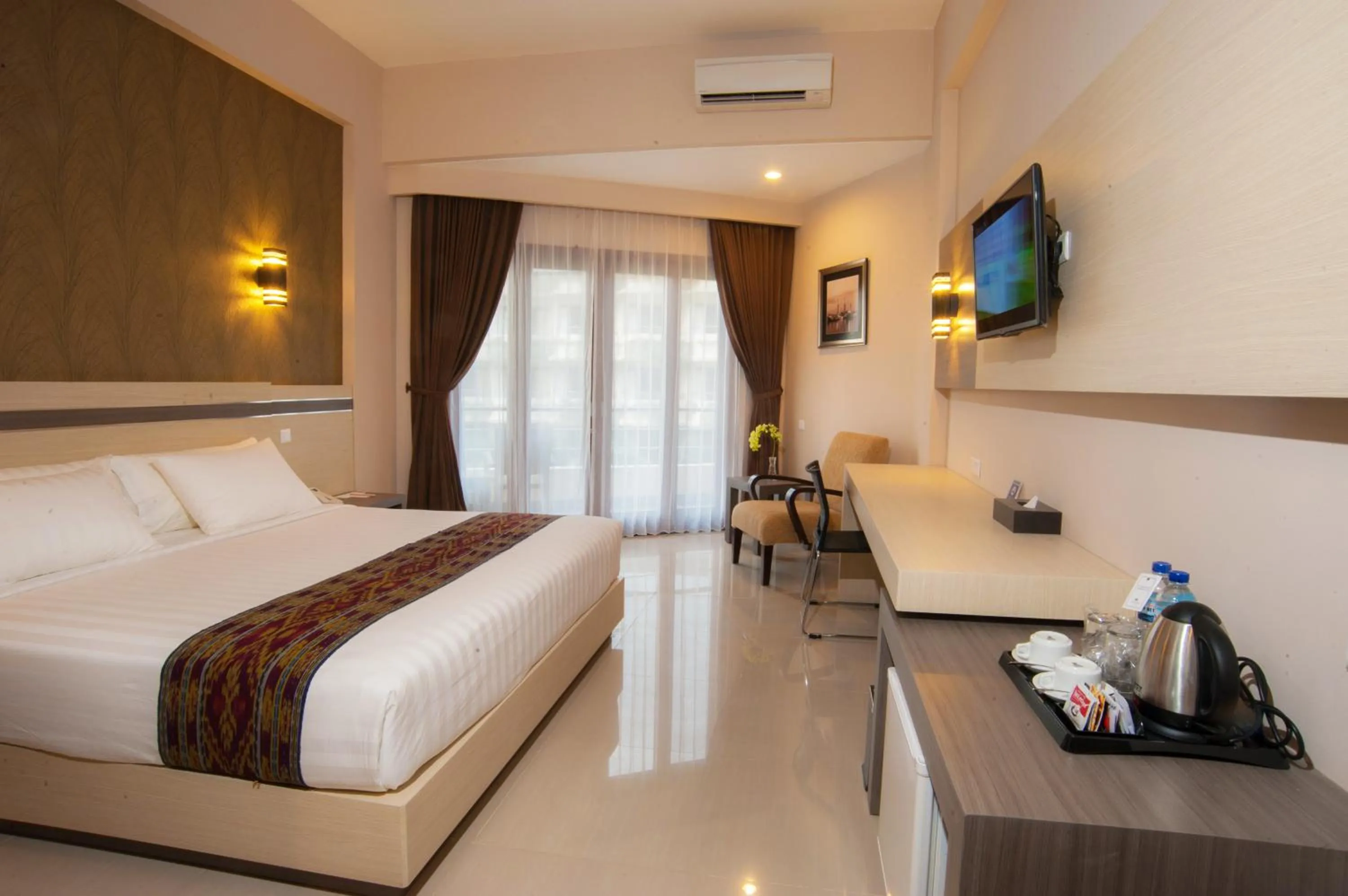 Bed in Lombok Raya Hotel