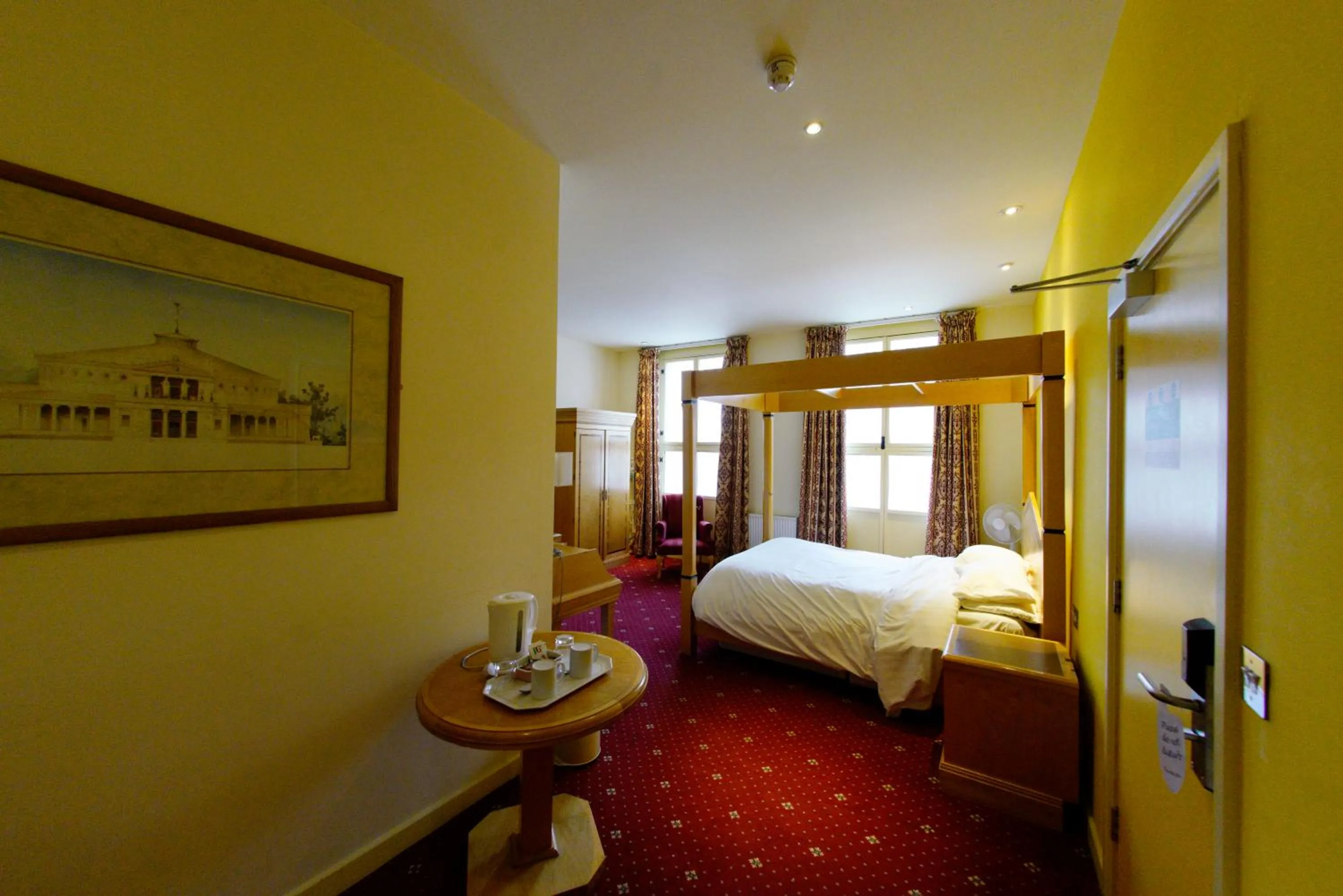 Bed in Three Queens Hotel