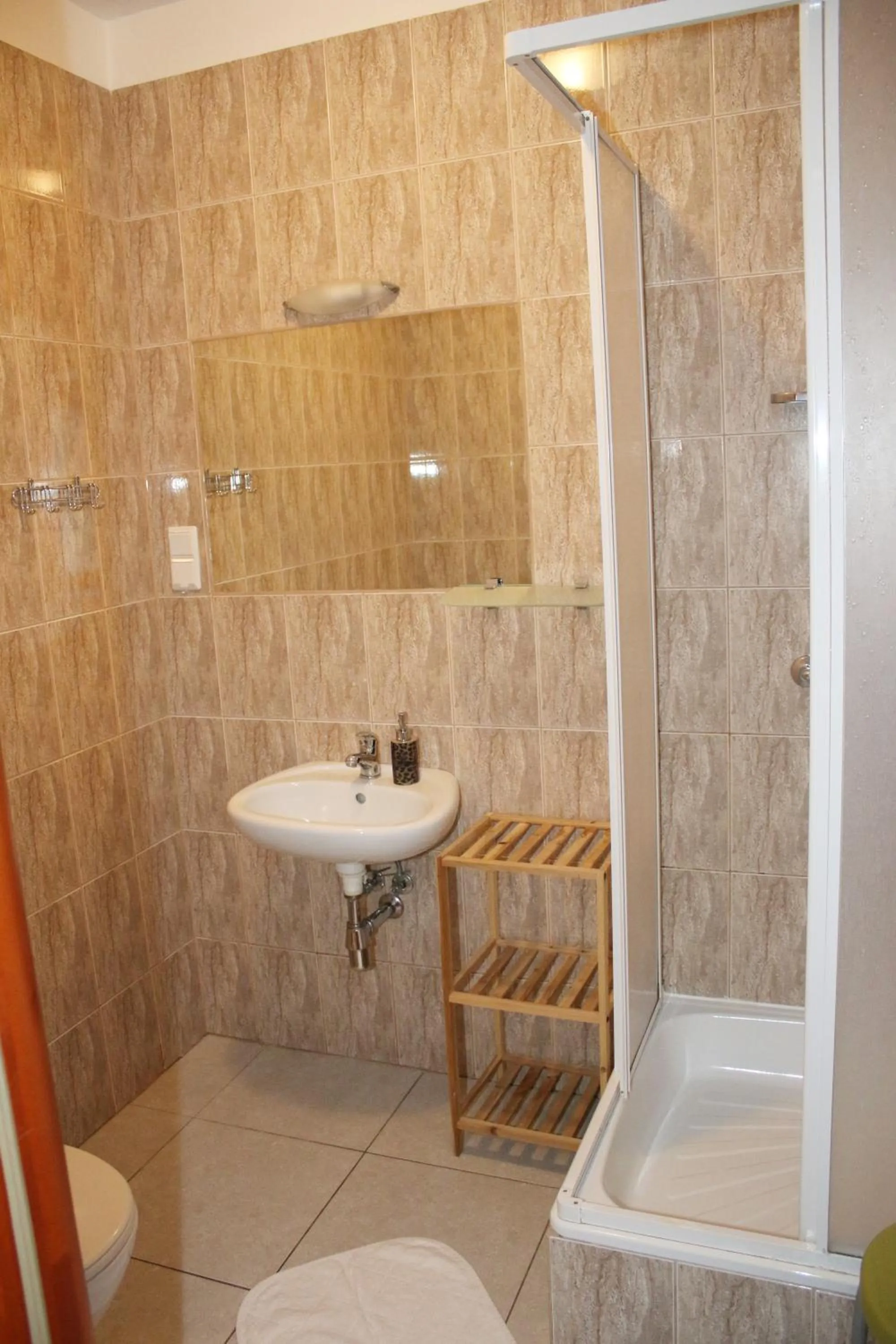Shower in Słoneczny Dom pokoje i apartament na wynajem