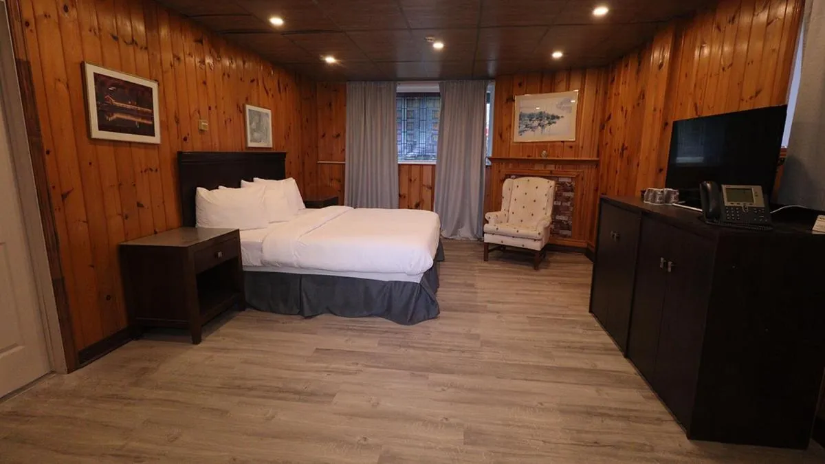 Bed in Algonquin Lakeside Inn