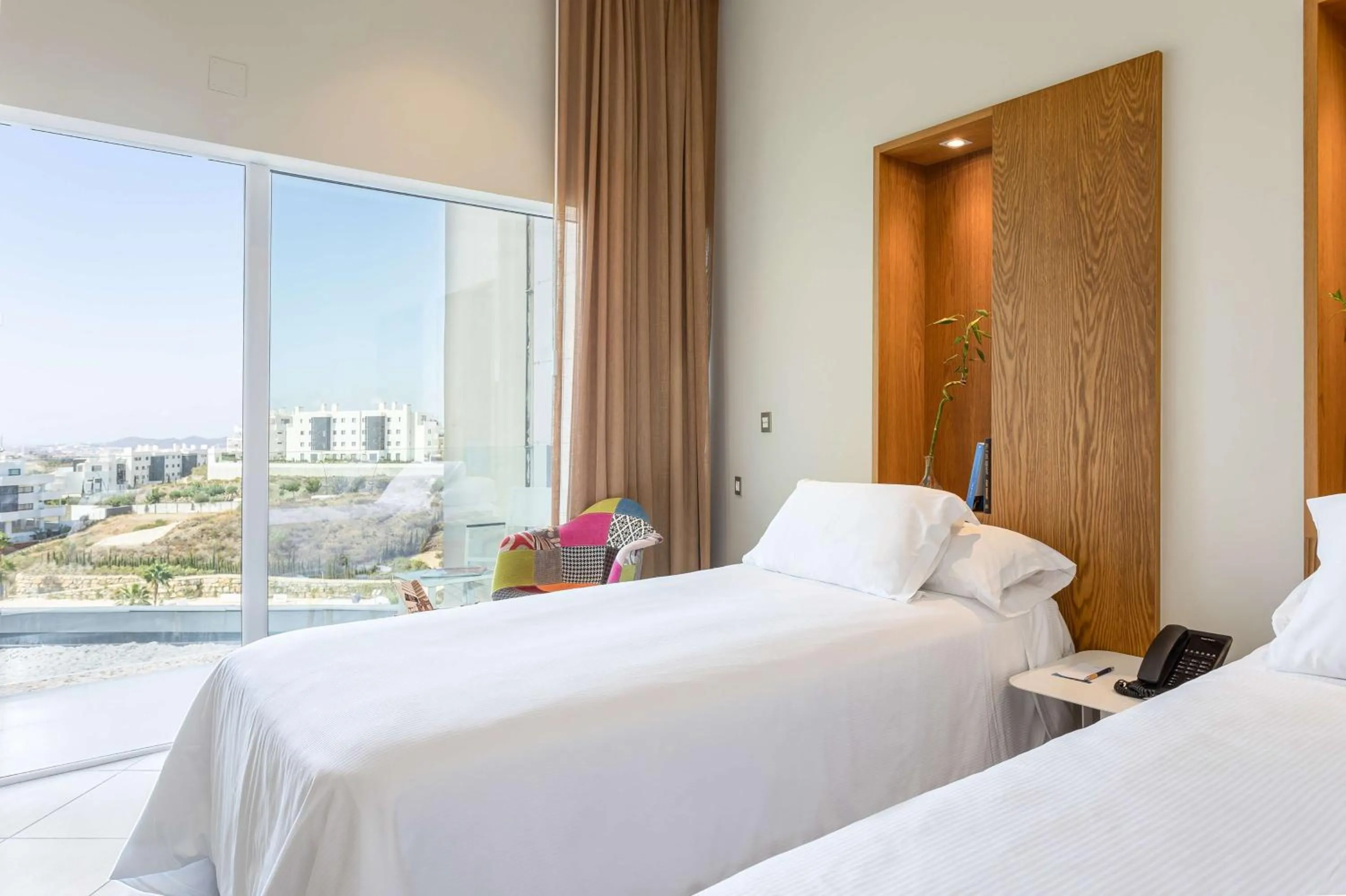 Bed in Higuerón Hotel Málaga, Curio Collection by Hilton