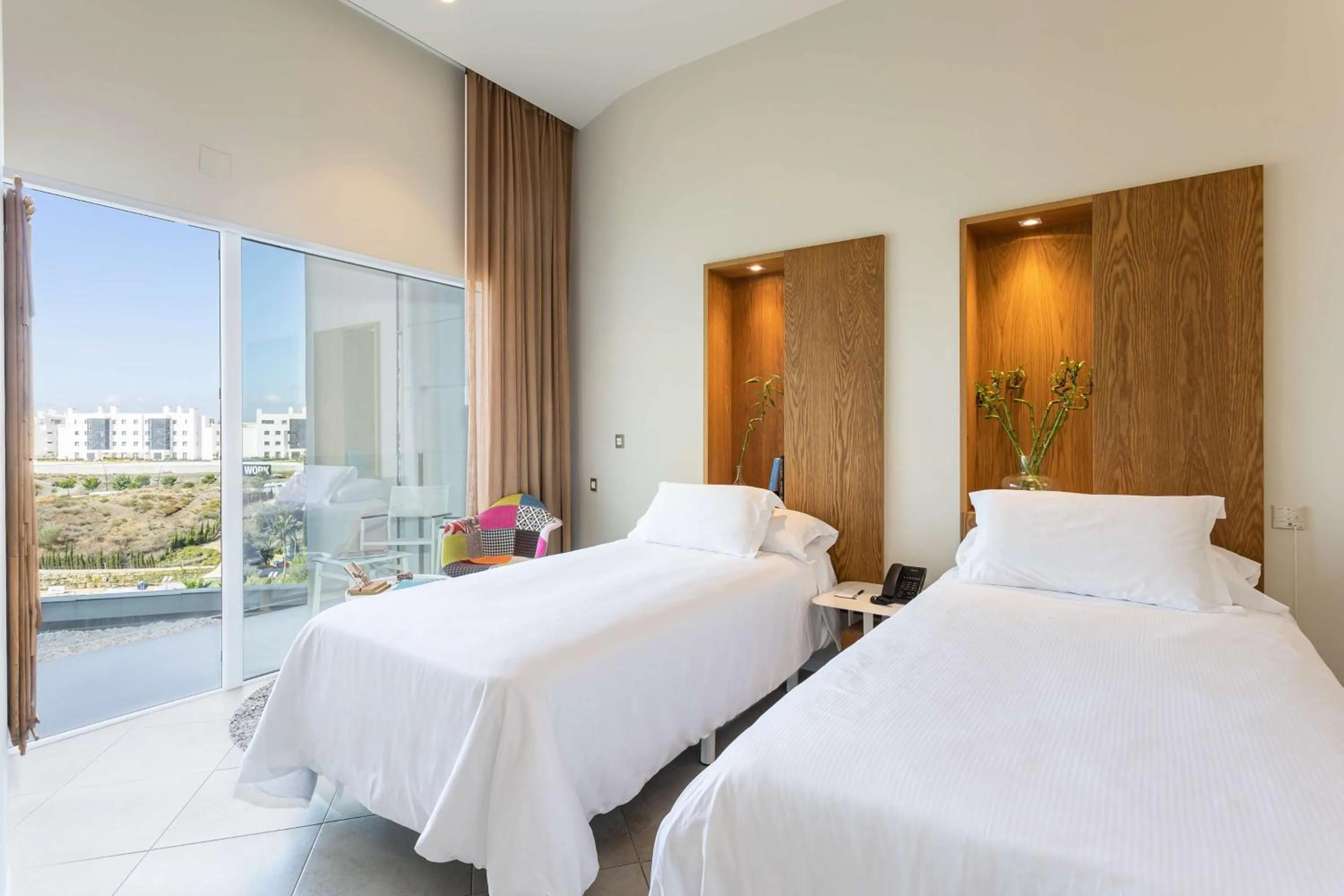 Bed in Higuerón Hotel Málaga, Curio Collection by Hilton