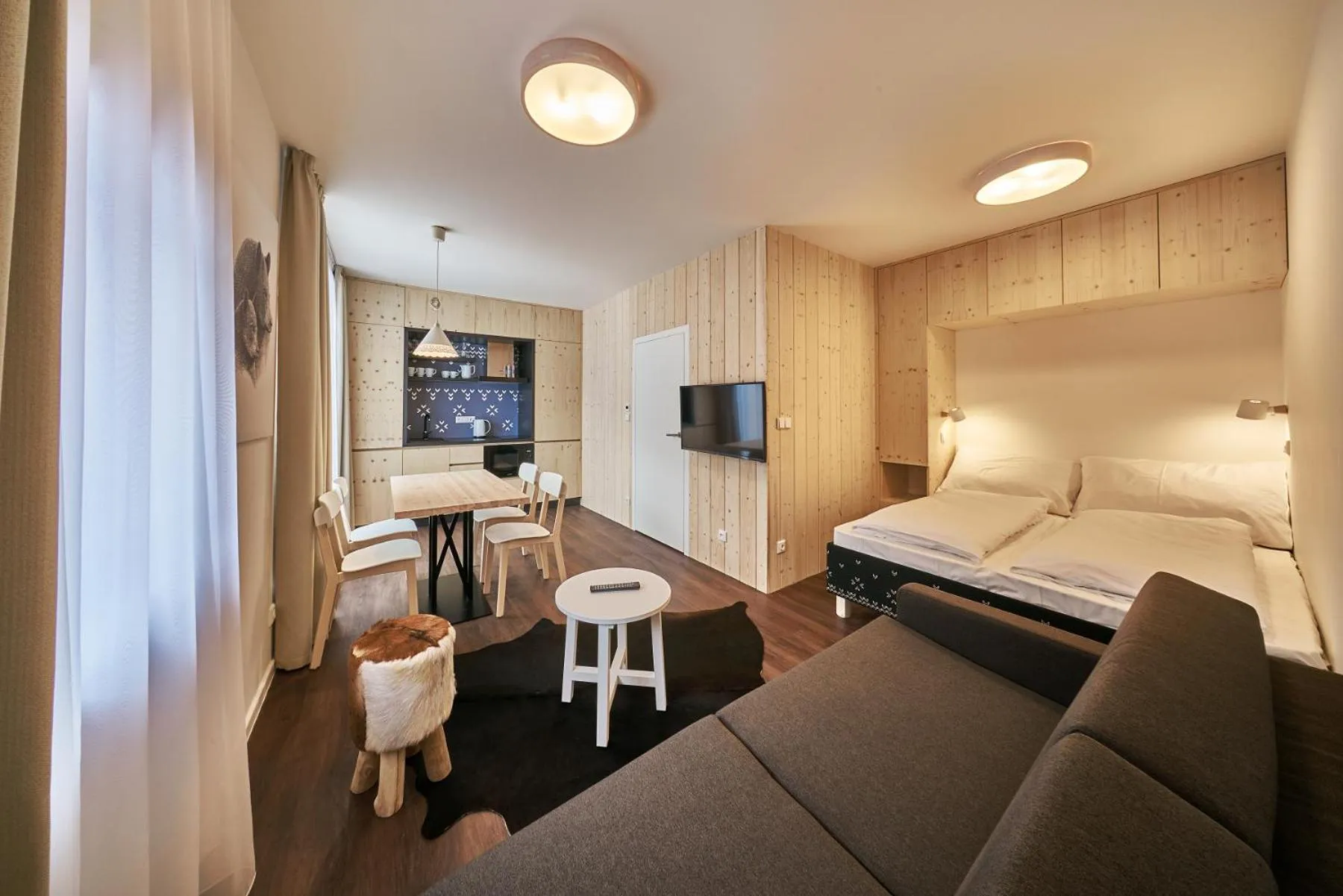 Kitchen or kitchenette, Bed in Aparthotel Svatý Vavřinec