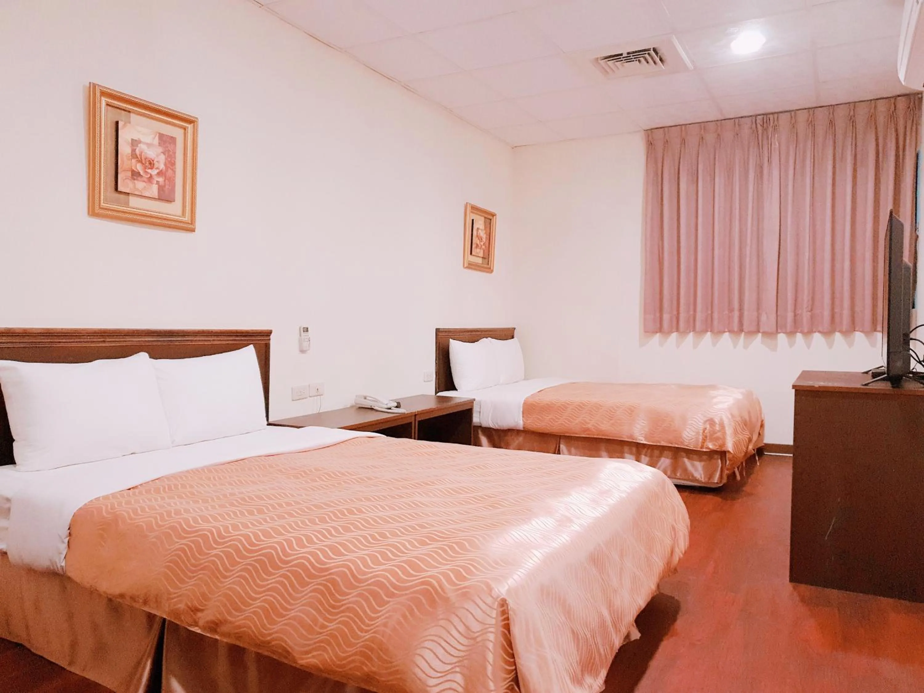 Bed in Blue Ocean Hotel