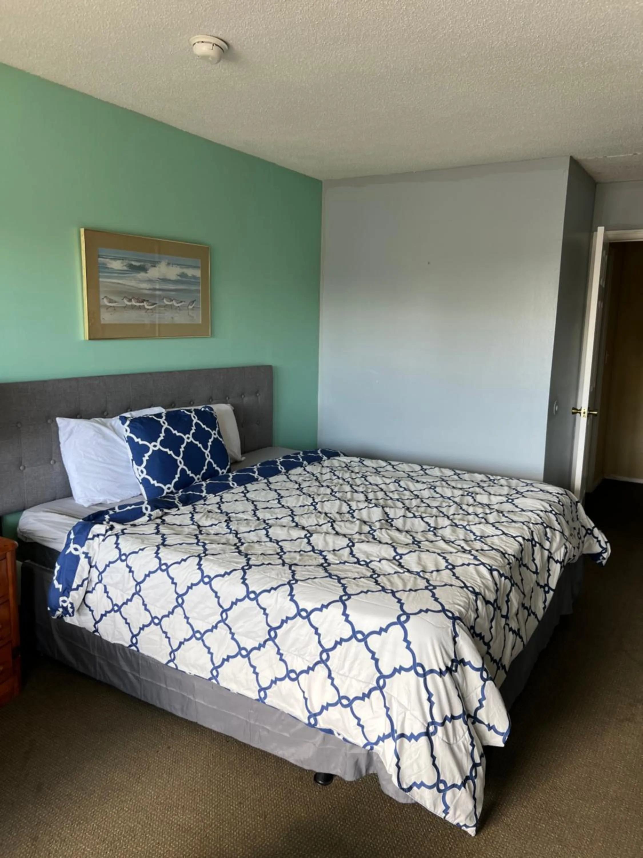 Bed in Ambassador Inn