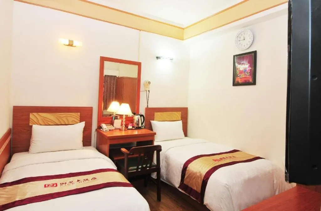 Bed in LI QING Hotel