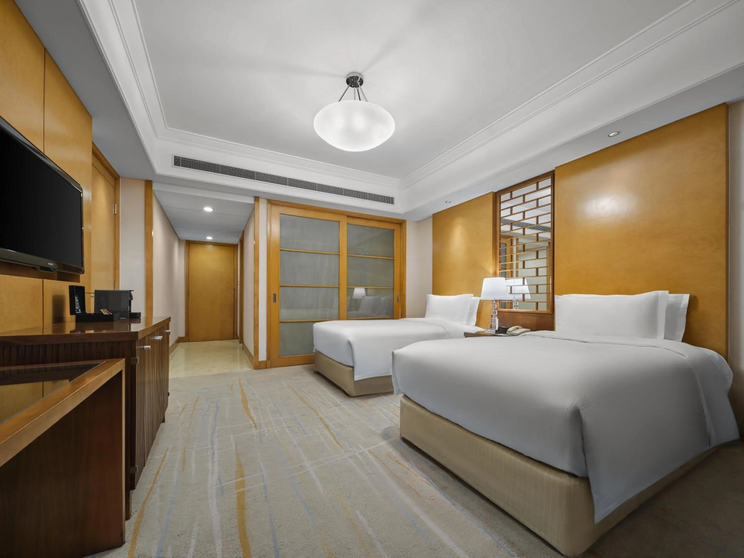 Bed in DoubleTree by Hilton Shanghai Pudong - Present welcome cookie