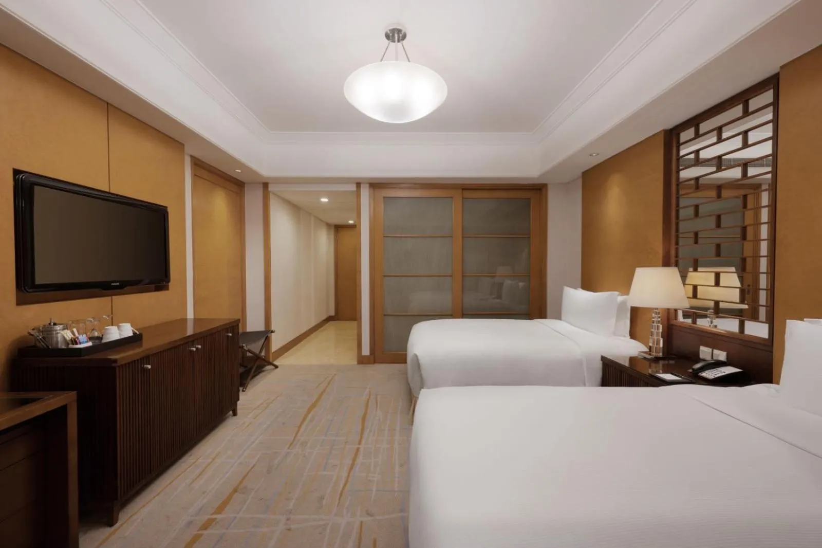 Photo of the whole room, Bed in DoubleTree by Hilton Shanghai Pudong - Present welcome cookie