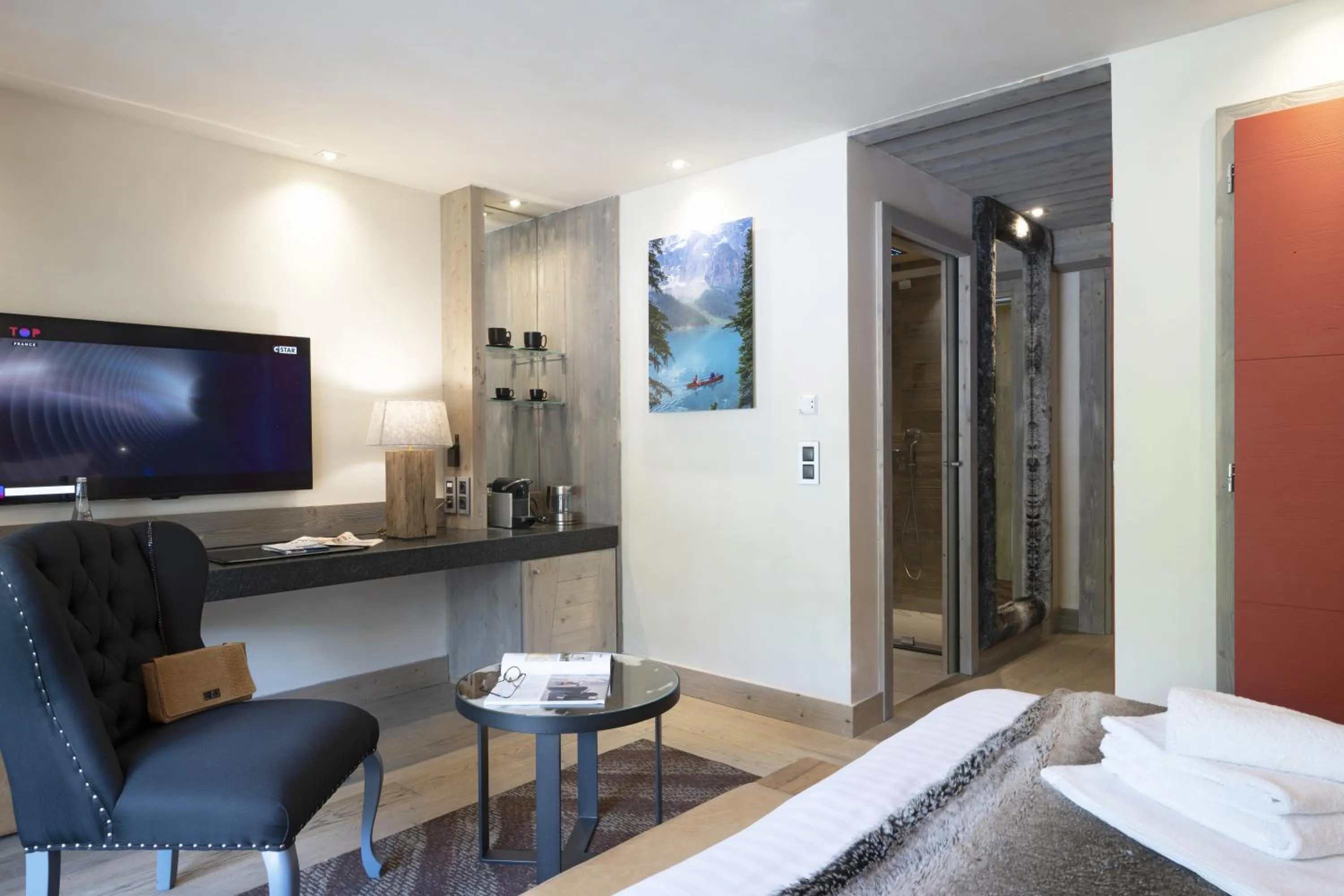 Seating area in MGM Hôtels & Résidences - Hôtel Les Suites d'Alexane