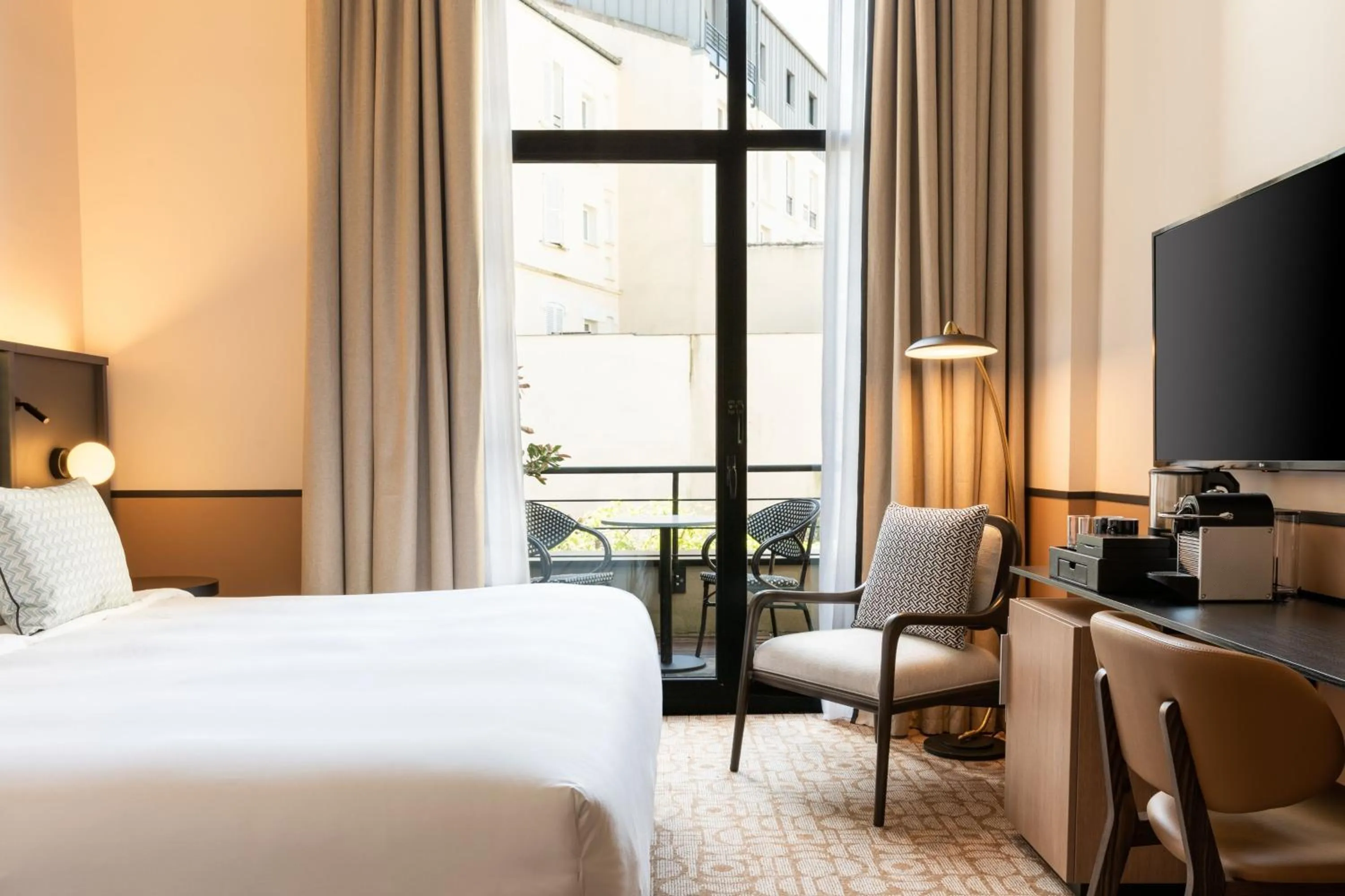 Photo of the whole room, Bed in Le Parchamp, a Tribute Portfolio Hotel, Paris Boulogne