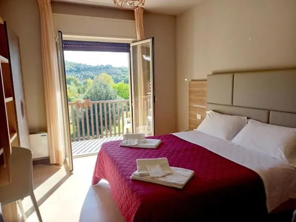 View (from property/room), Bed in Hotel Torricella