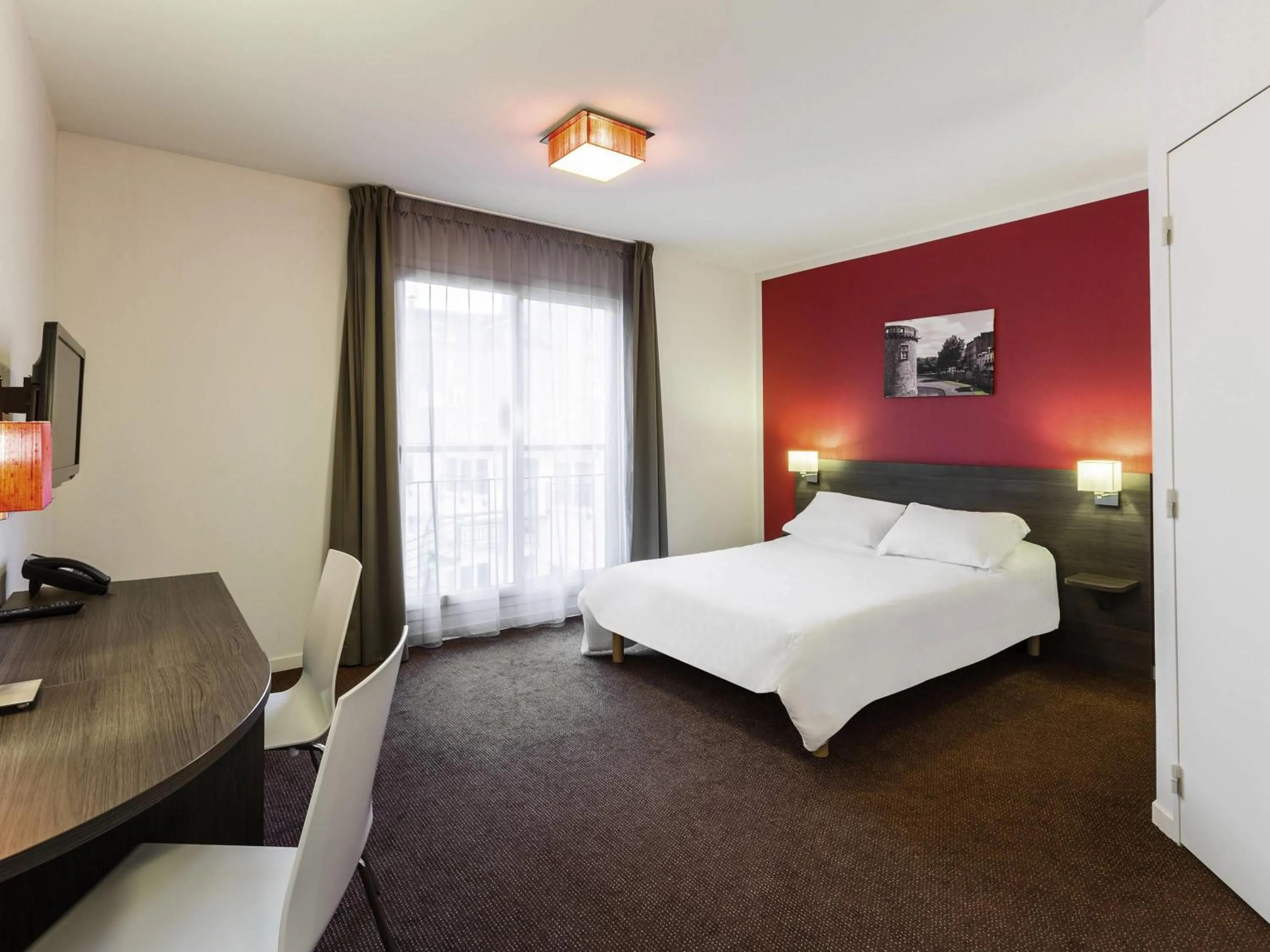 Bedroom, Bed in Aparthotel Adagio Access Nantes Viarme