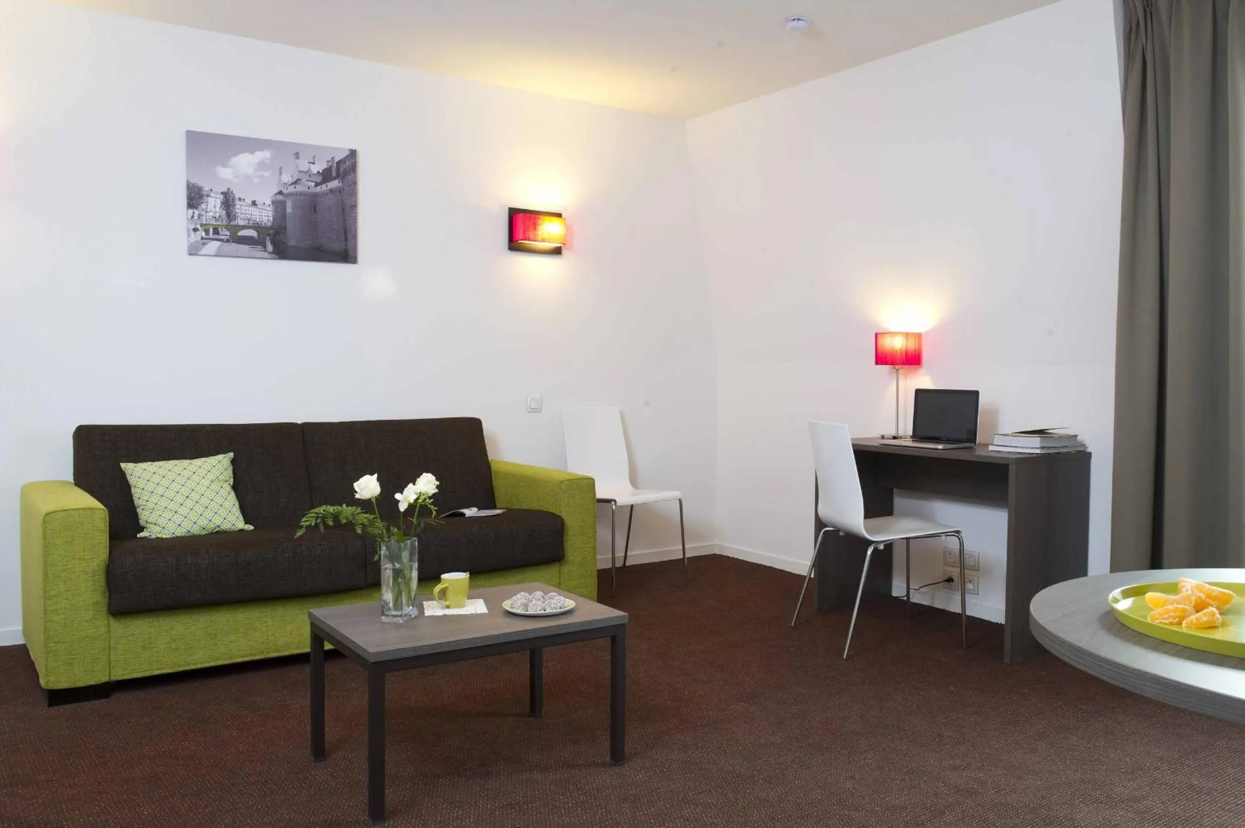 Communal lounge/ TV room in Aparthotel Adagio Access Nantes Viarme