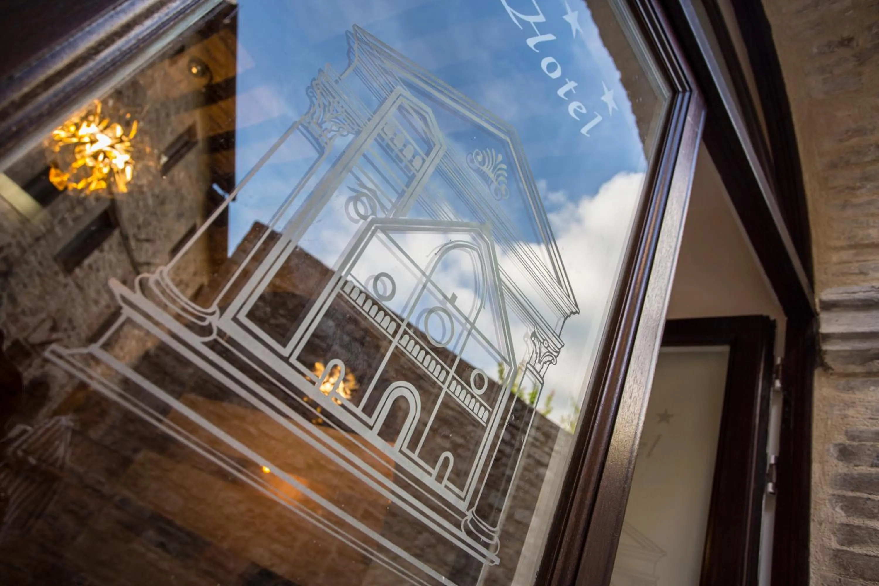 Property logo or sign in Hotel Il Duomo