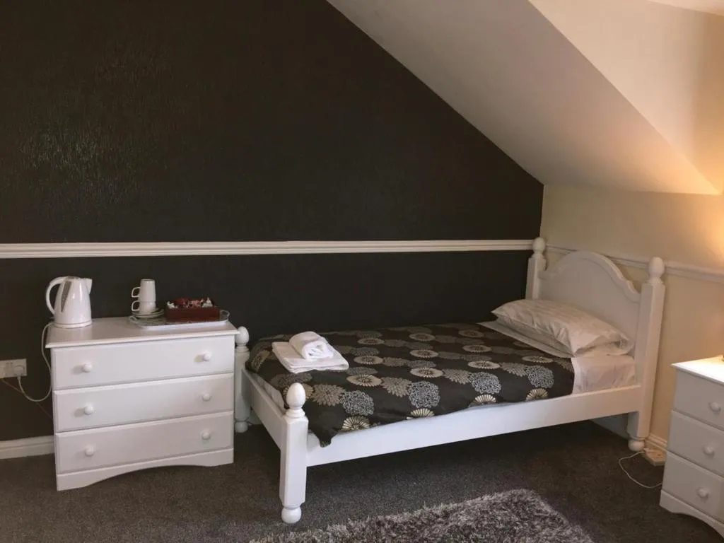 Bed in Lake Lounge Rooms