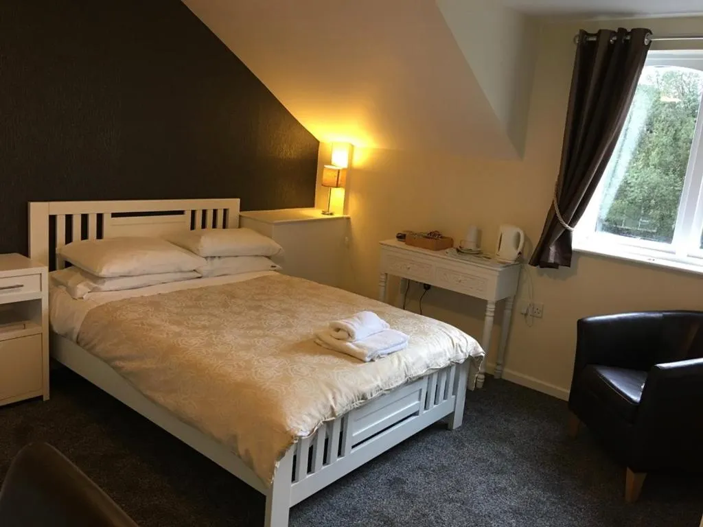 Bed in Lake Lounge Rooms