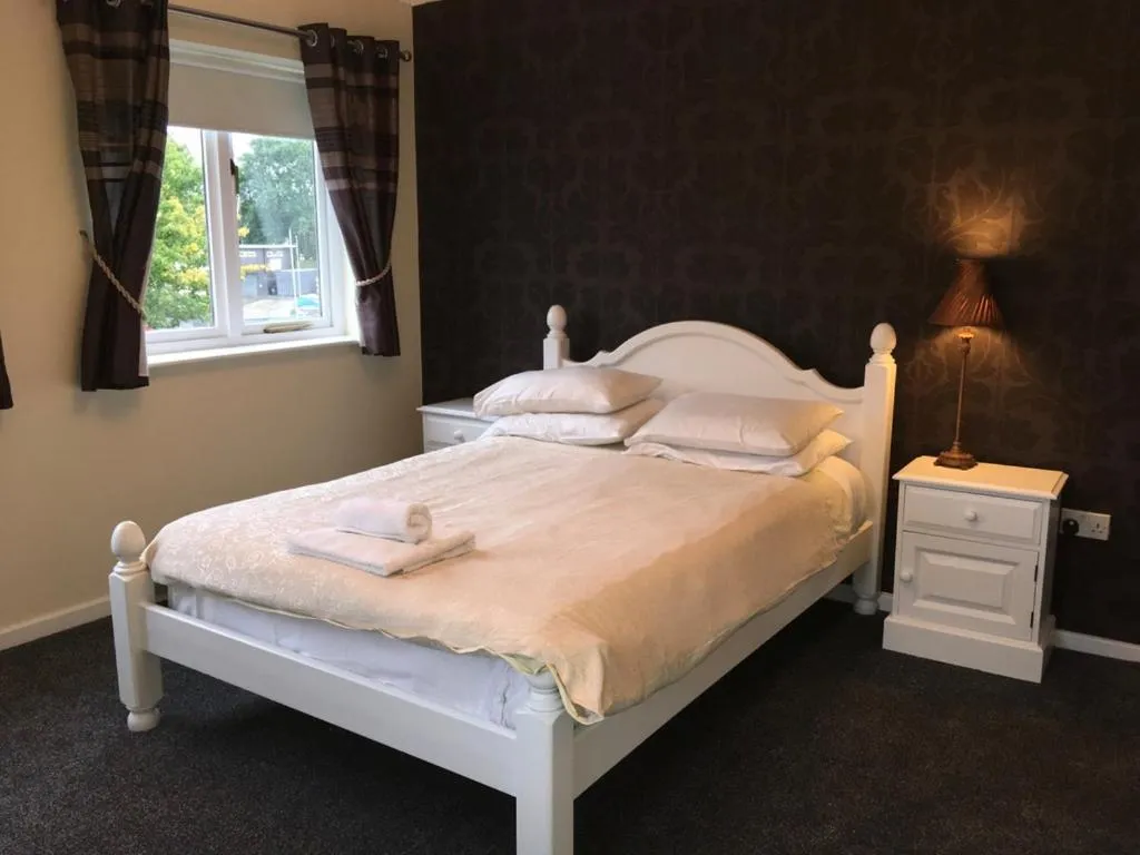 Bed in Lake Lounge Rooms