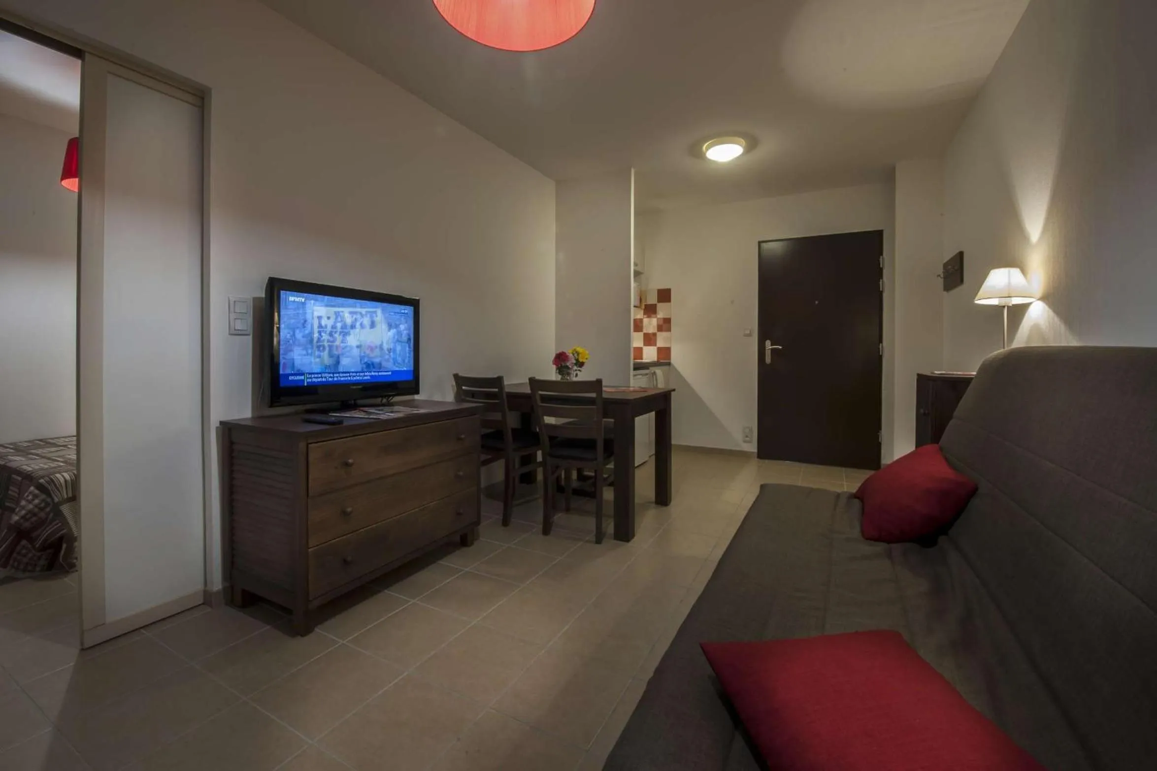 Living room in Vacancéole - Résidence Le Clos du Rocher