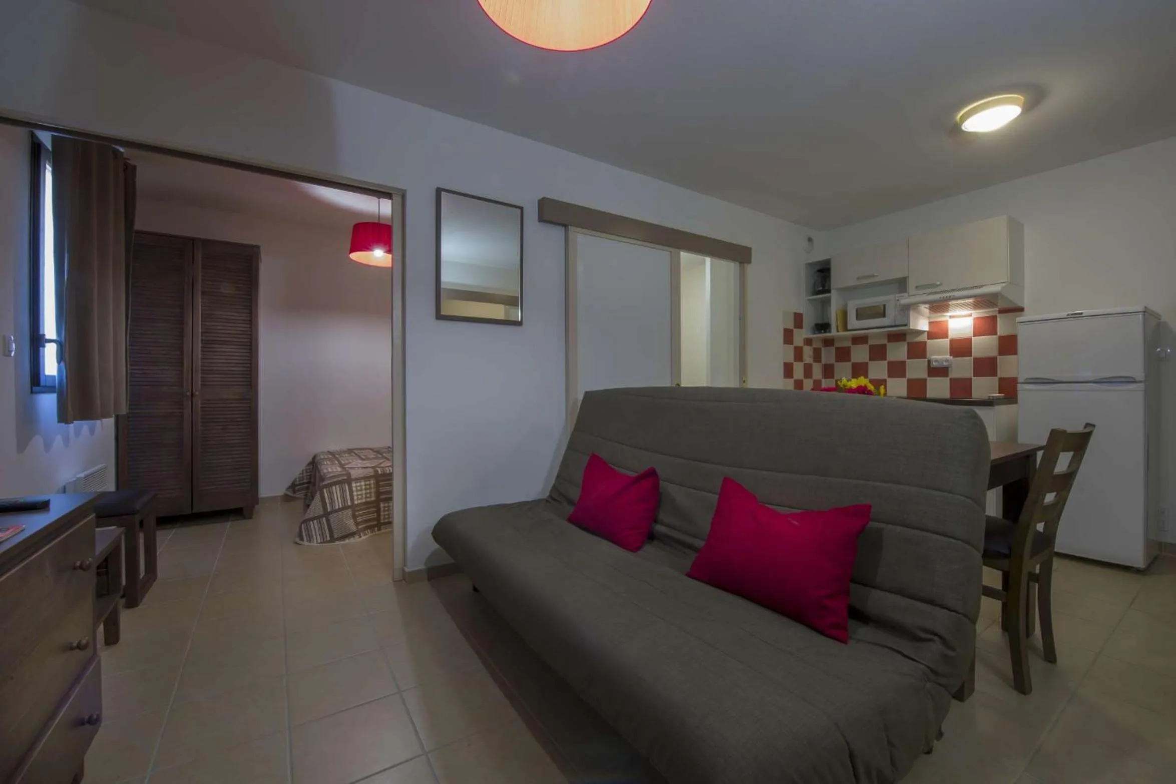 Living room in Vacancéole - Résidence Le Clos du Rocher