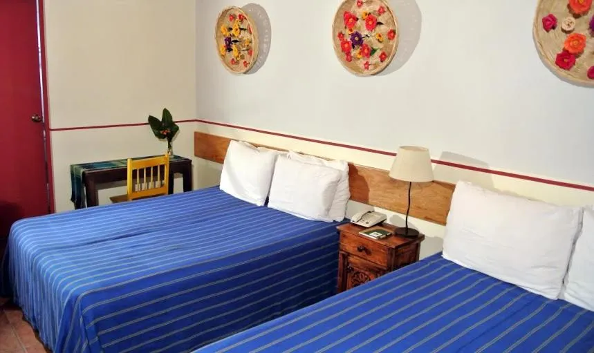 Photo of the whole room, Bed in Arbol de Fuego Eco-hotel