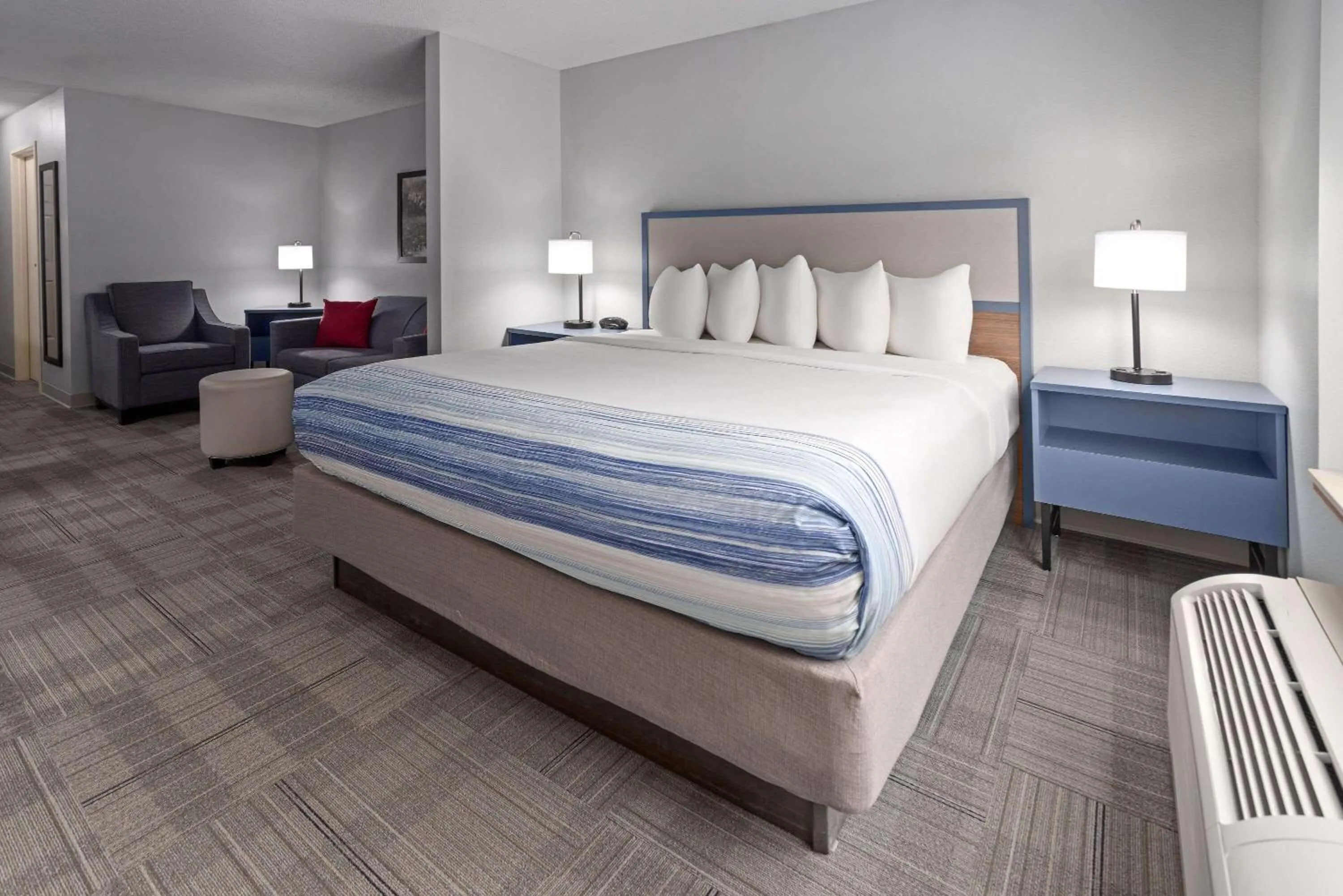 Photo of the whole room, Bed in AmericInn by Wyndham Iron Mountain