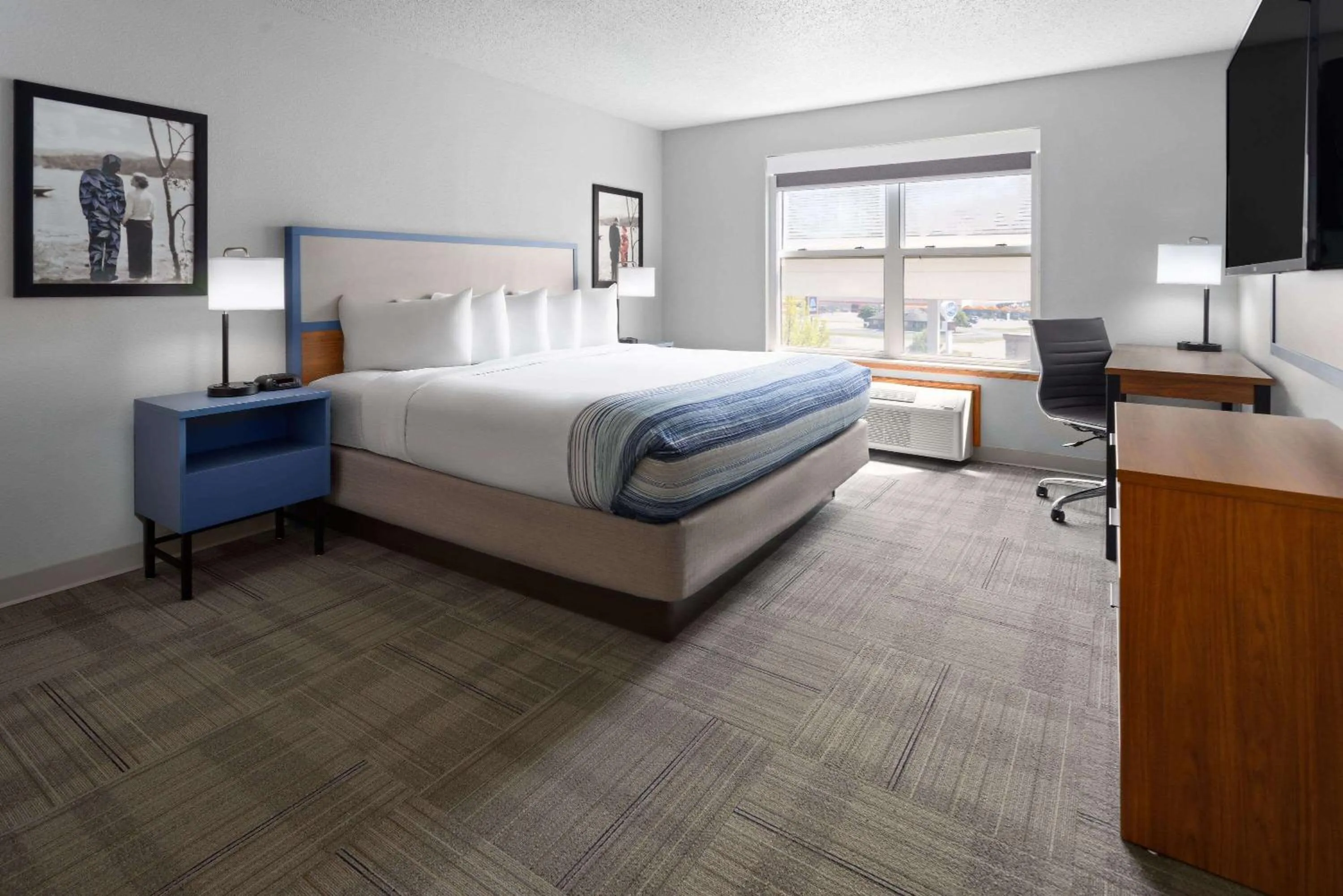 Photo of the whole room, Bed in AmericInn by Wyndham Iron Mountain