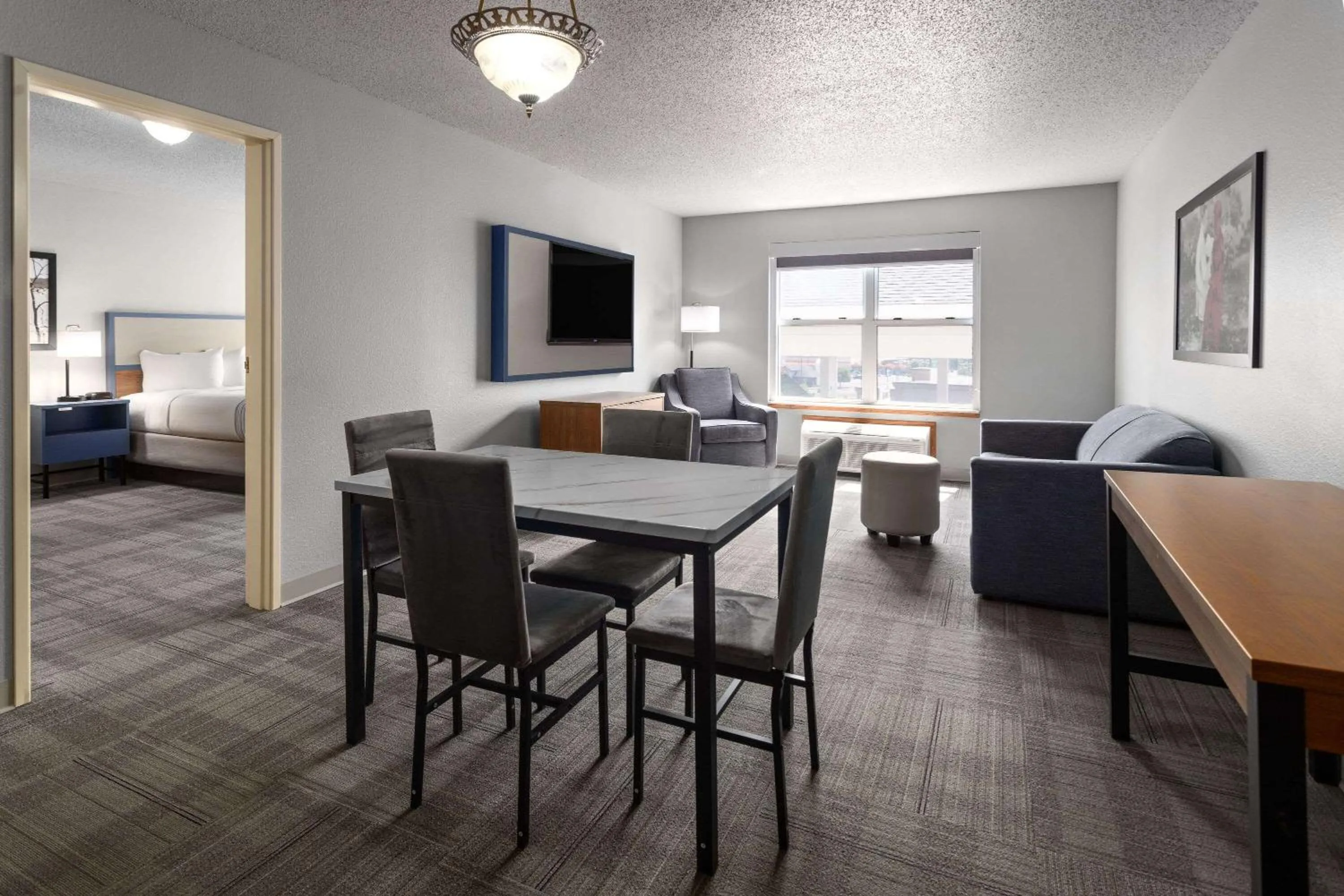 Photo of the whole room in AmericInn by Wyndham Iron Mountain