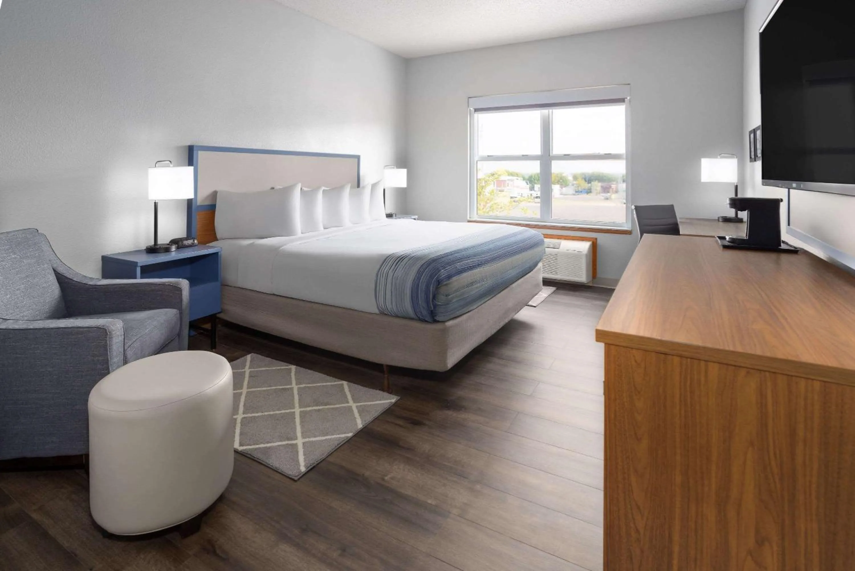 Photo of the whole room, Bed in AmericInn by Wyndham Iron Mountain
