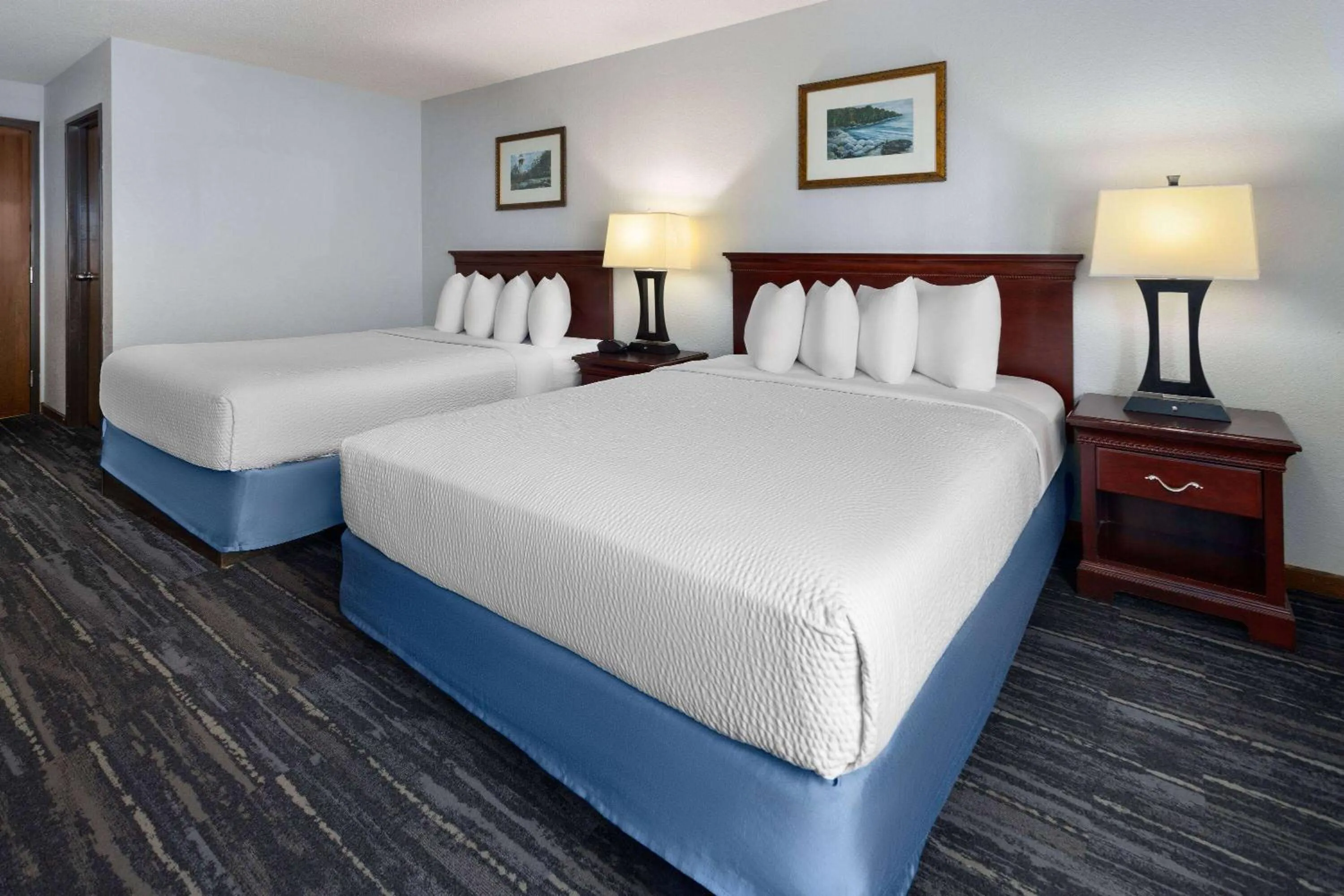Photo of the whole room, Bed in Days Inn by Wyndham Iron Mountain