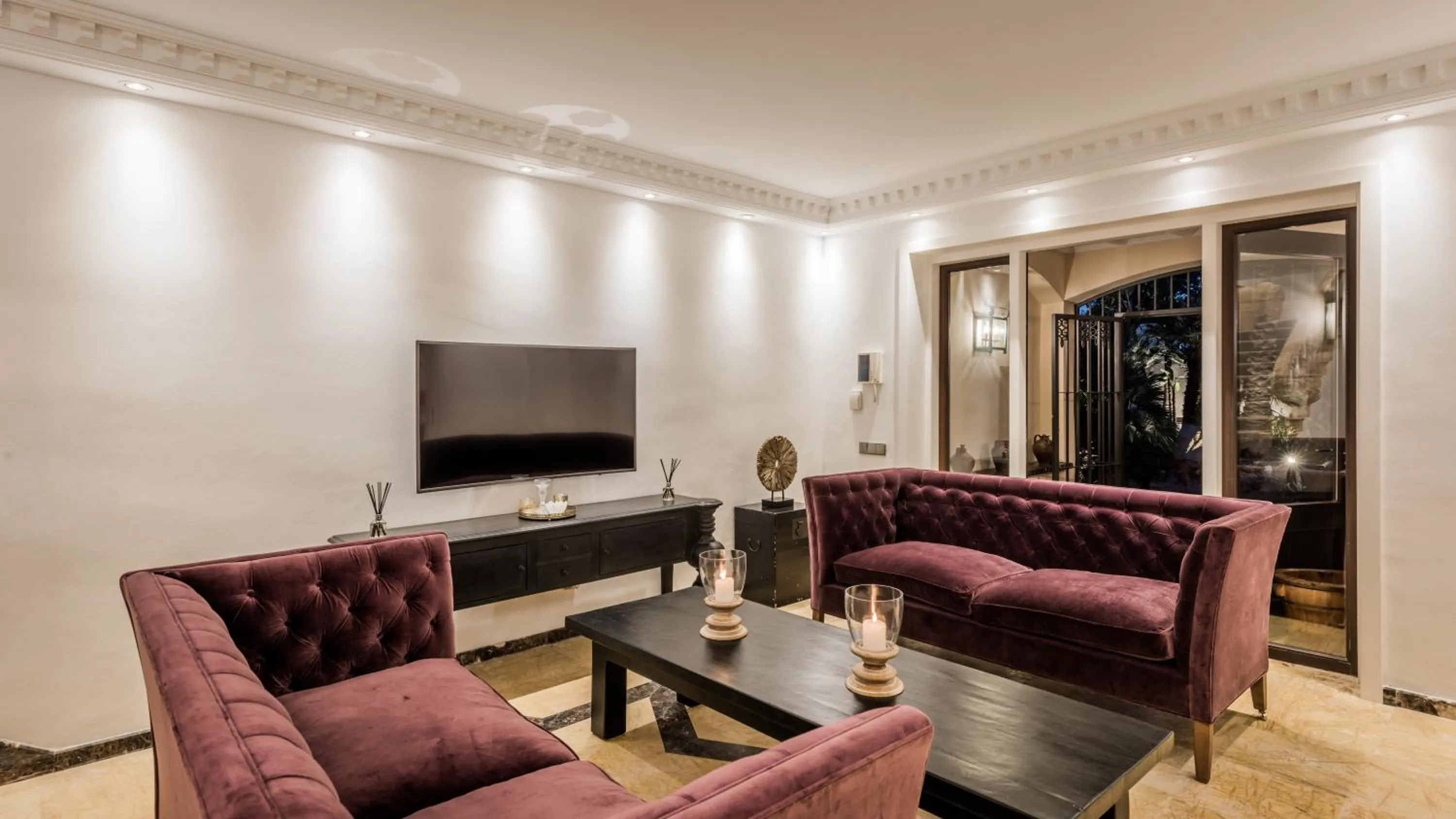 Communal lounge/ TV room in The Residence by the Beach House Marbella