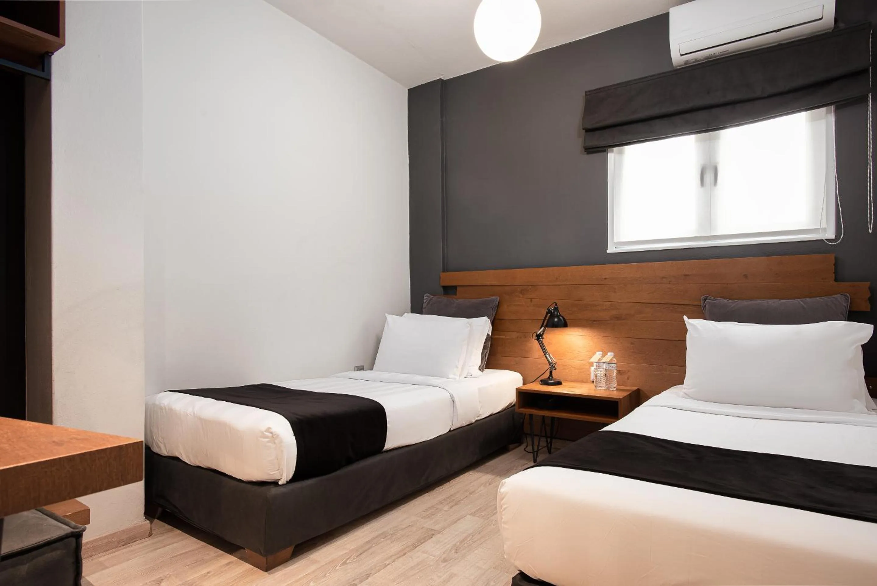 Bed in Acropolis Luxury Living