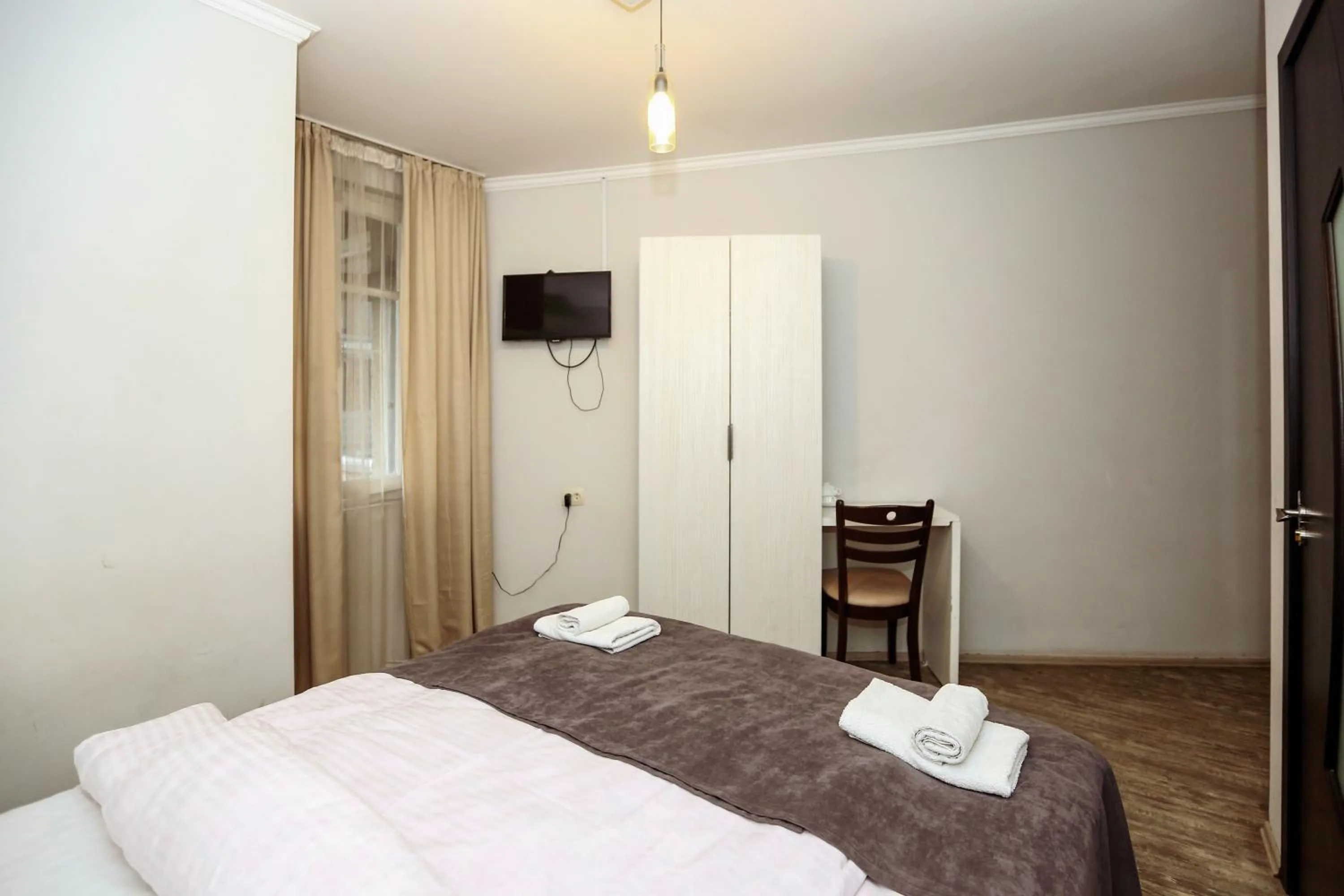 Communal lounge/ TV room, Bed in Hotel Rustaveli 36