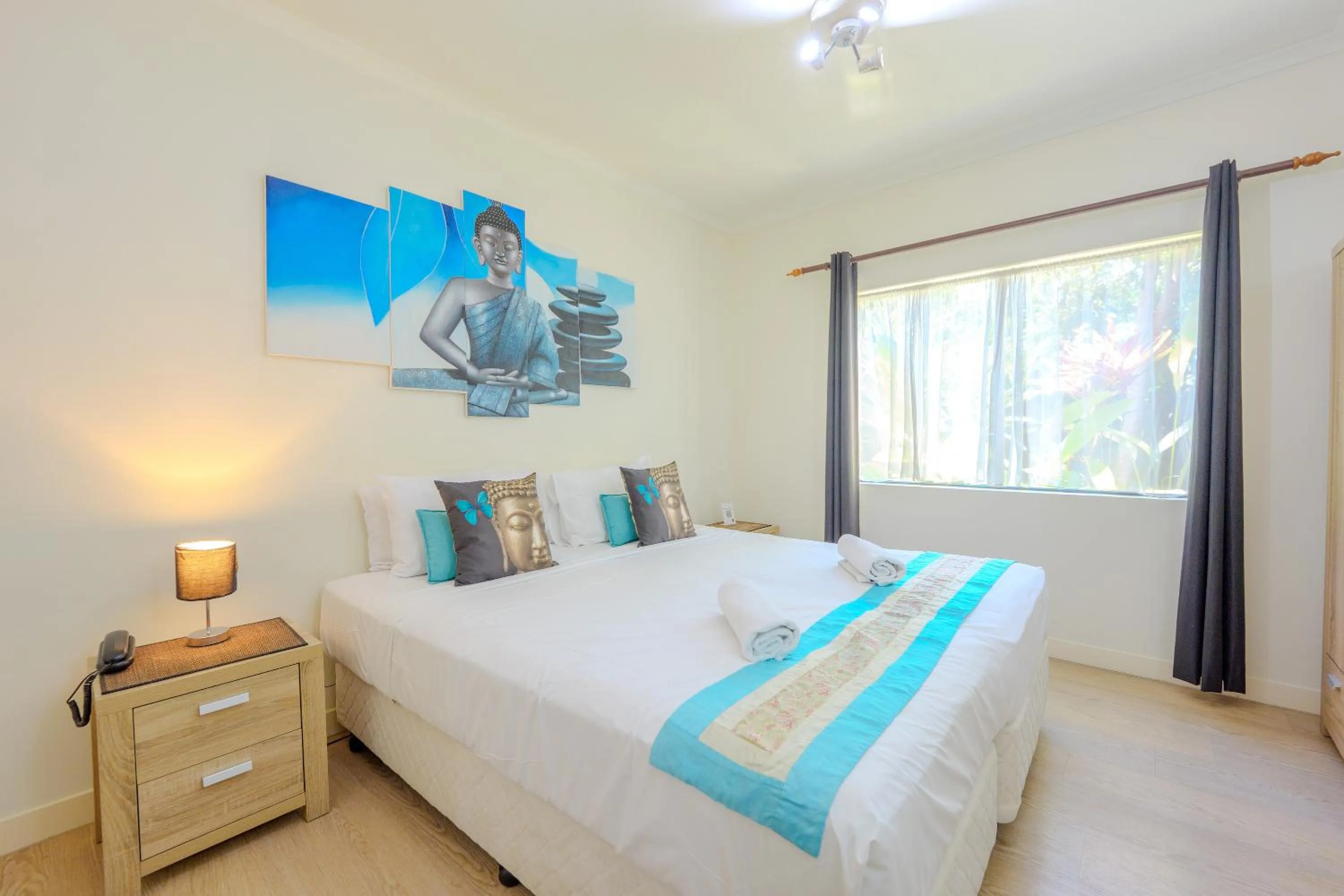 Bed in Mango Lagoon Resort & Wellness Spa