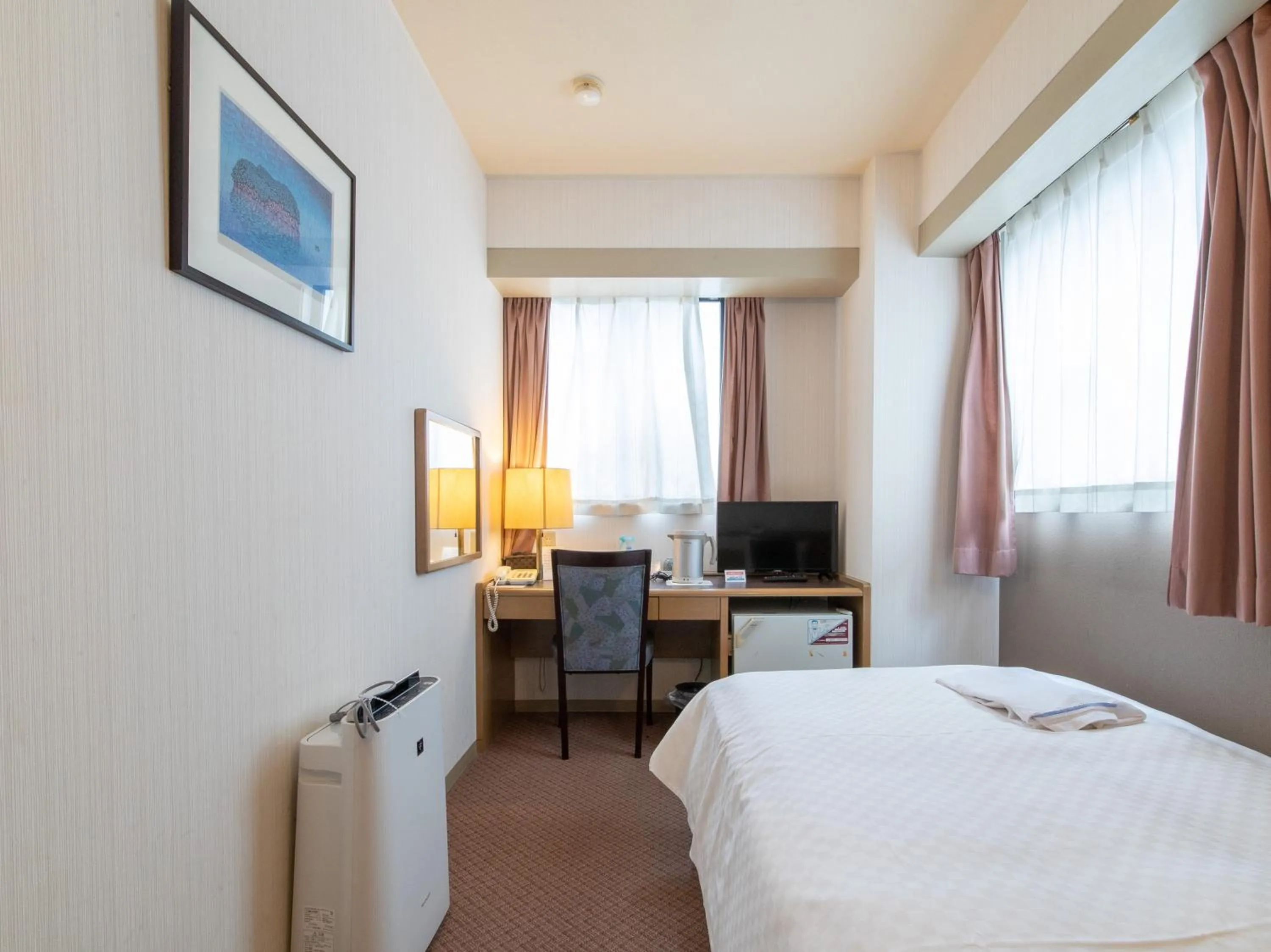 Bed in Nagasaki Orion Hotel