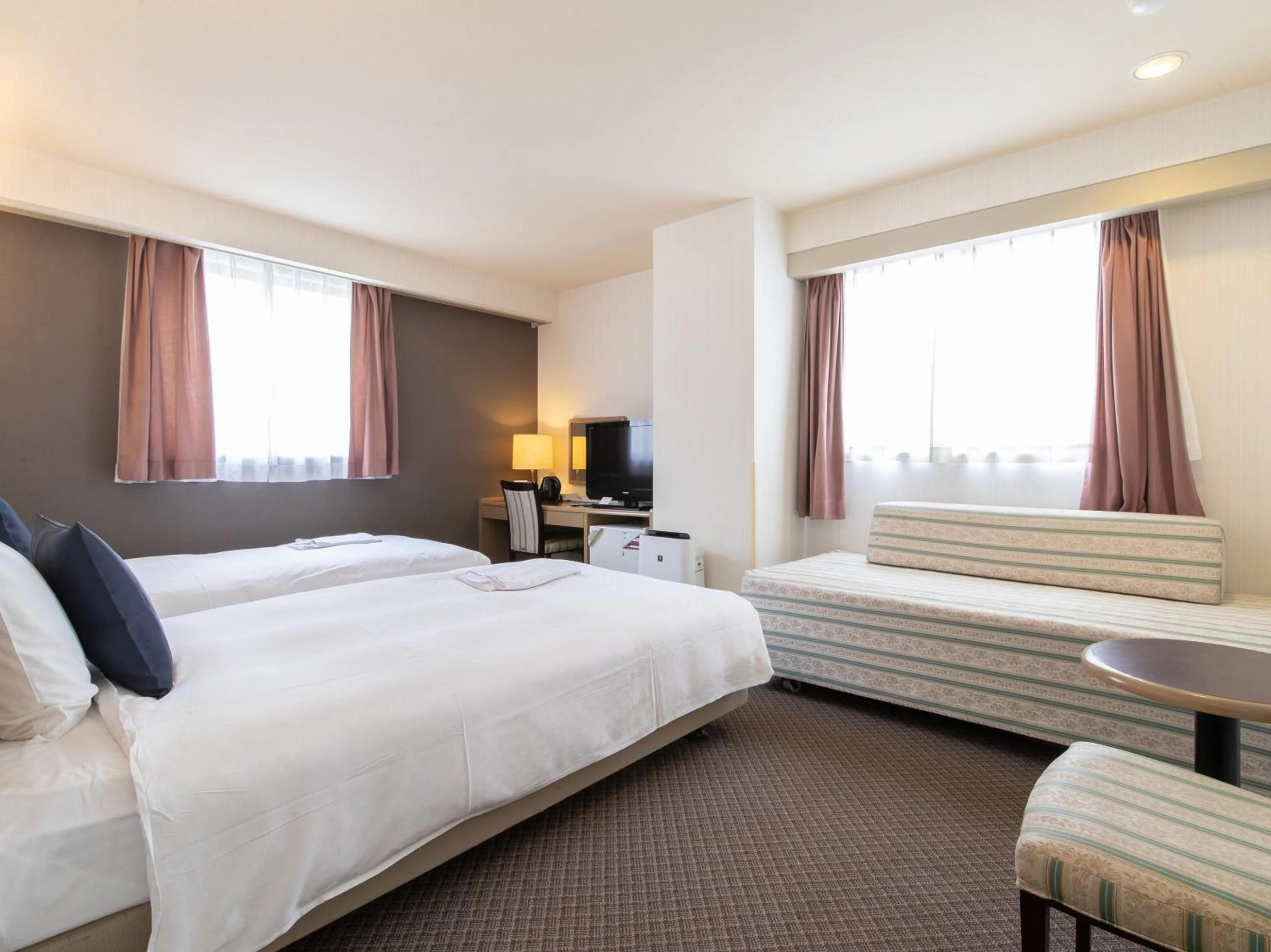 Bed in Nagasaki Orion Hotel