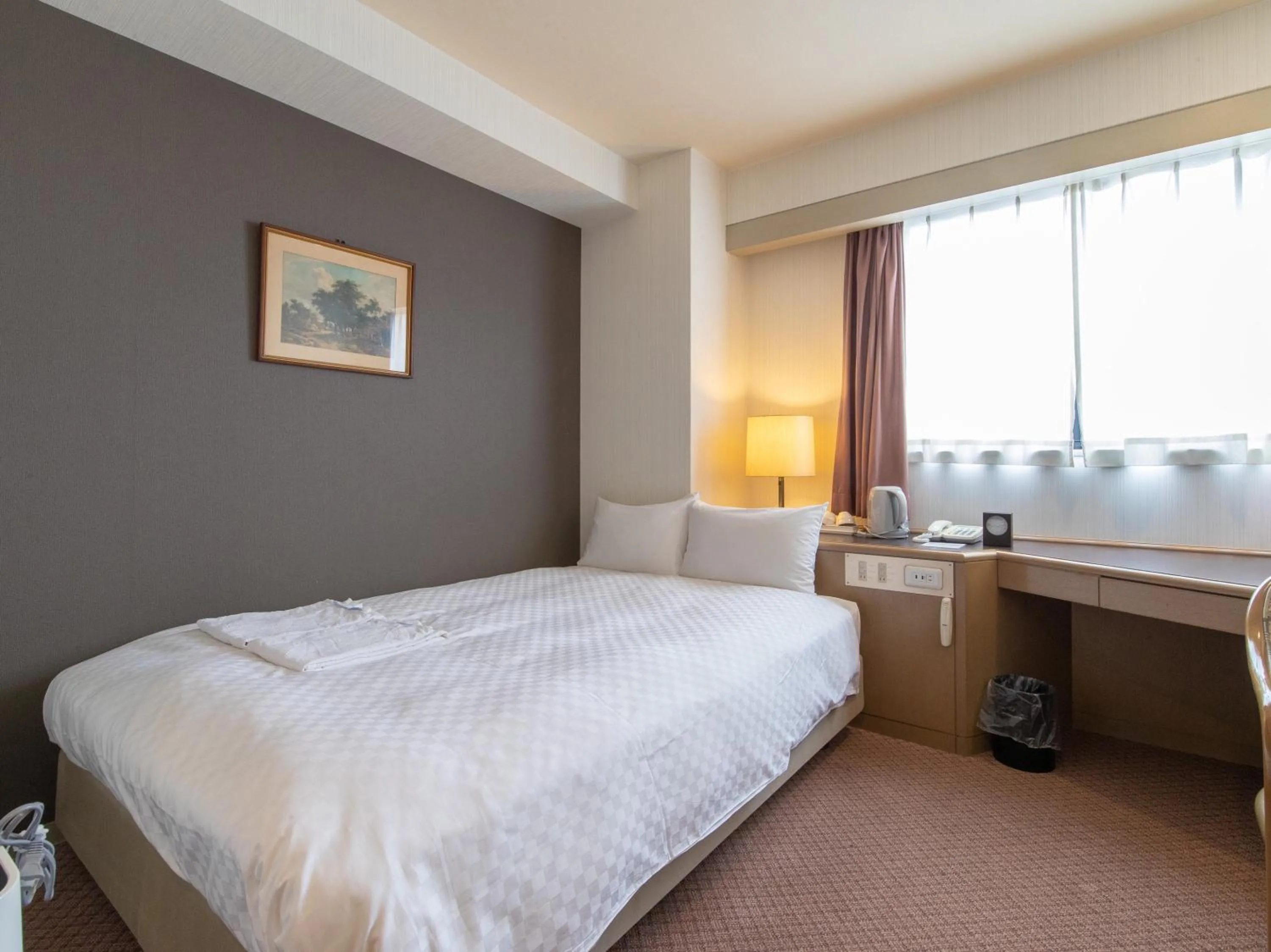 Bed in Nagasaki Orion Hotel